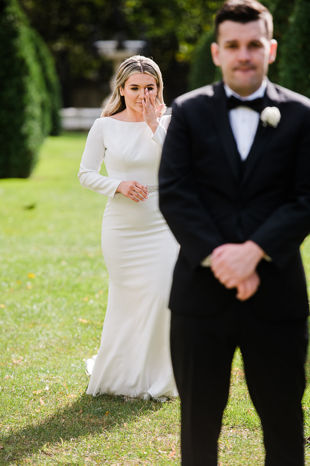 bride and groom emotional first look approach