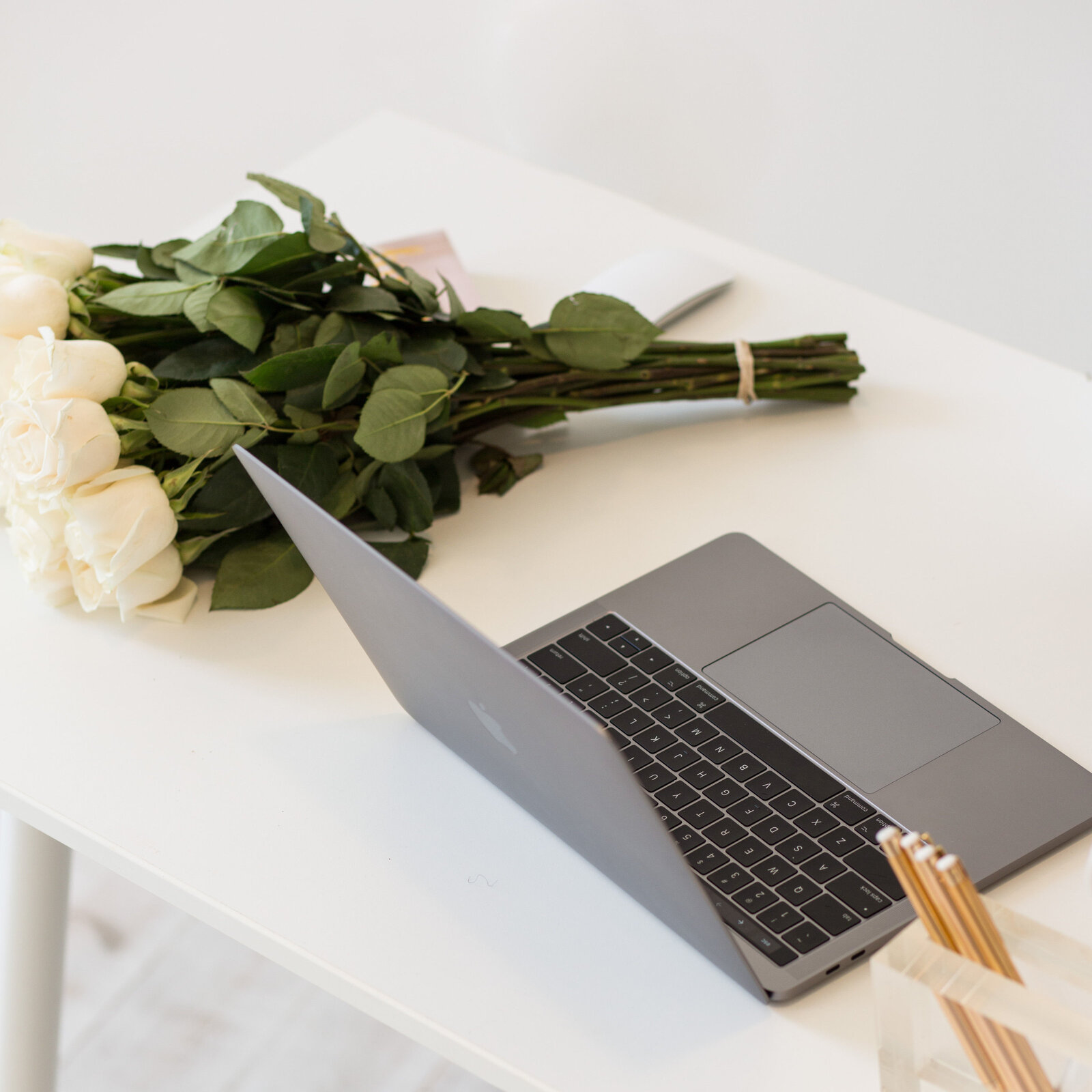 Color image of laptop and flowers