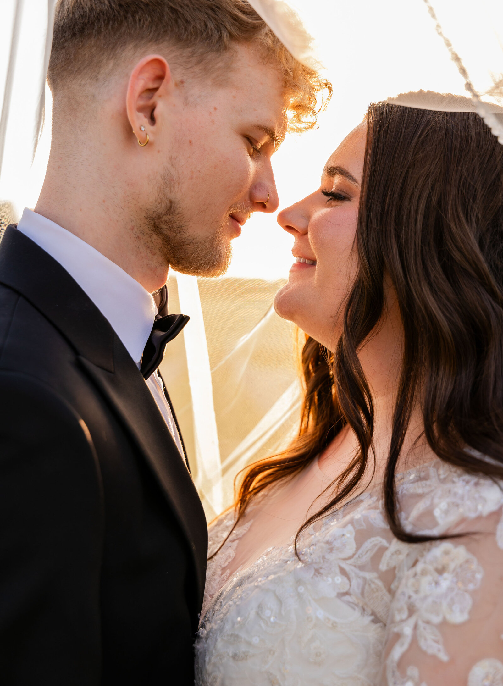 smiling bride and groom