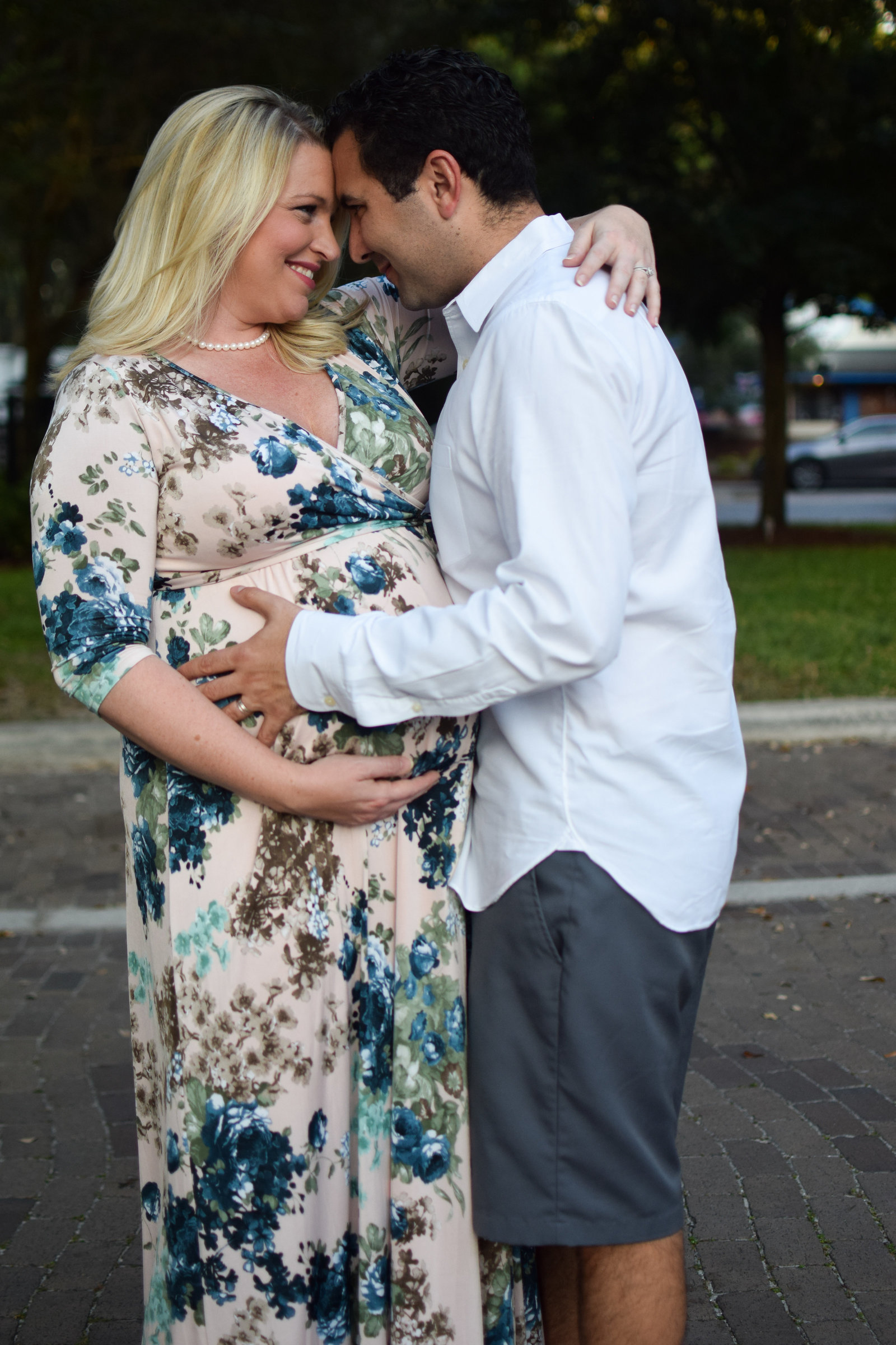 Maternity Pregnant Couple hugging Windermere Florida