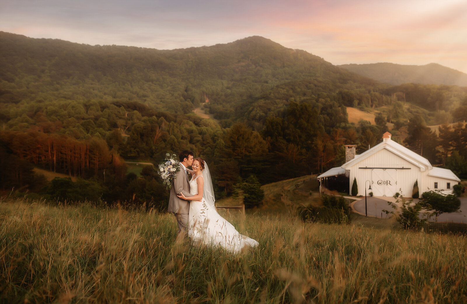 Newlyweds pose for Wedding Photos at Chestnut Ridge Events in Asheville, NC.