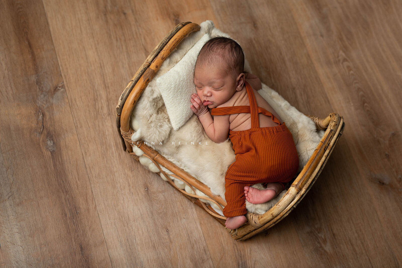 Tiny-bed-rust-outfit-newborn-boy-san-antonio-tx-photographer