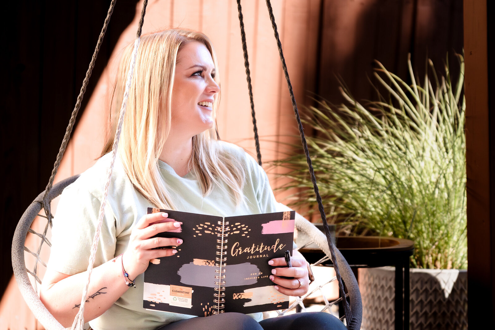 life coach with a journal in her hands