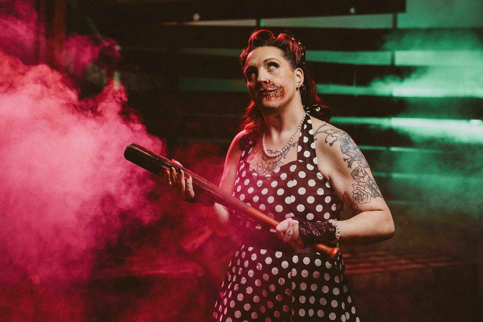 spooky woman holding a baseball bat