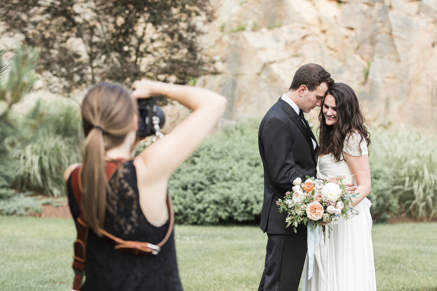 Lauren Dobish Photography taking picture of bride and groom