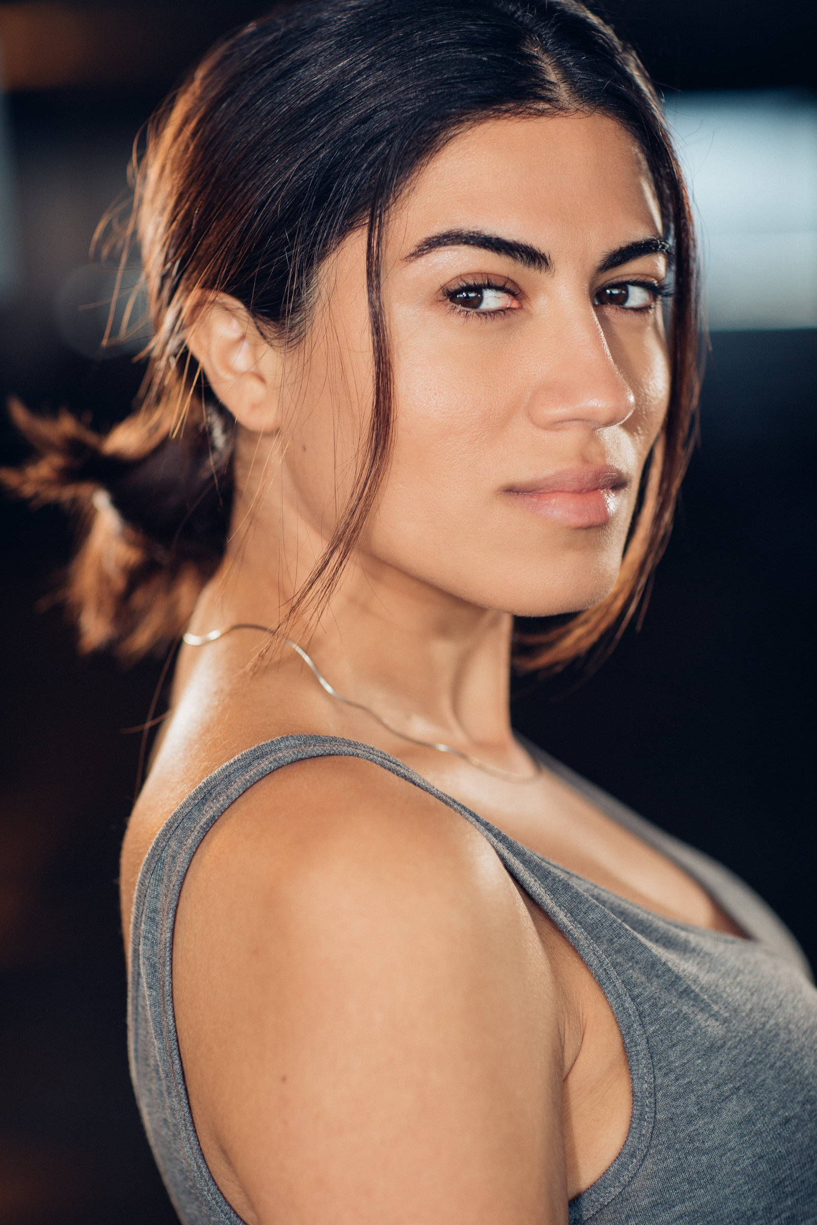 Headshot Photograph Of Young Woman In Gray Tank Top Los Angeles