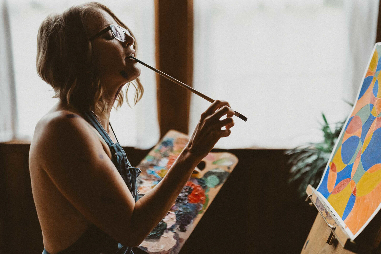 photo of a woman painting