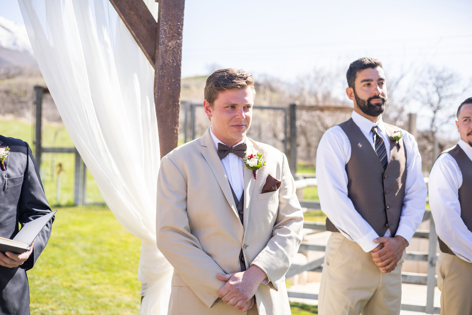 Groom's reaction to seeing bride walk down the aisle with her dad