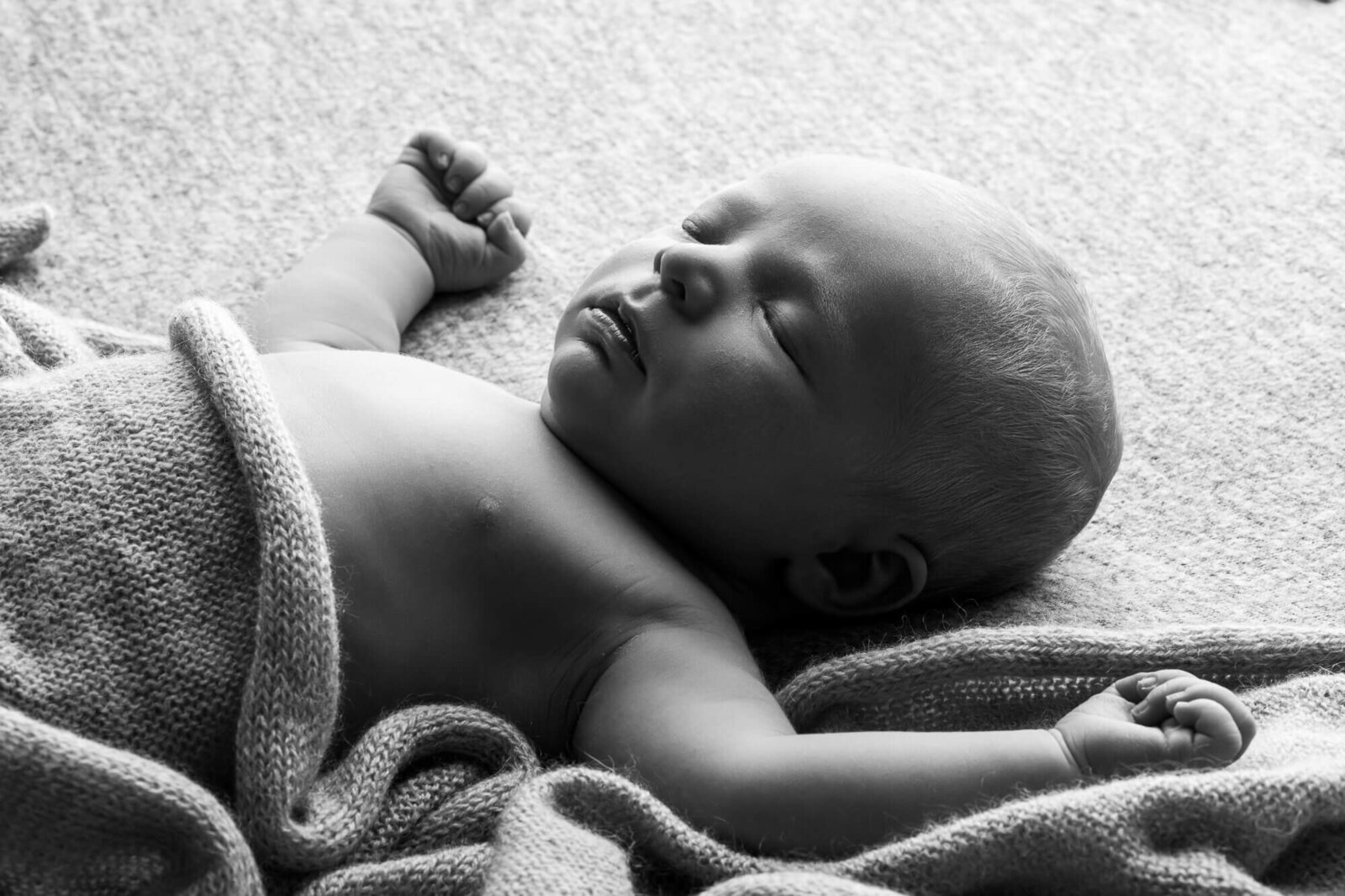 black and white portrait of sleeping baby