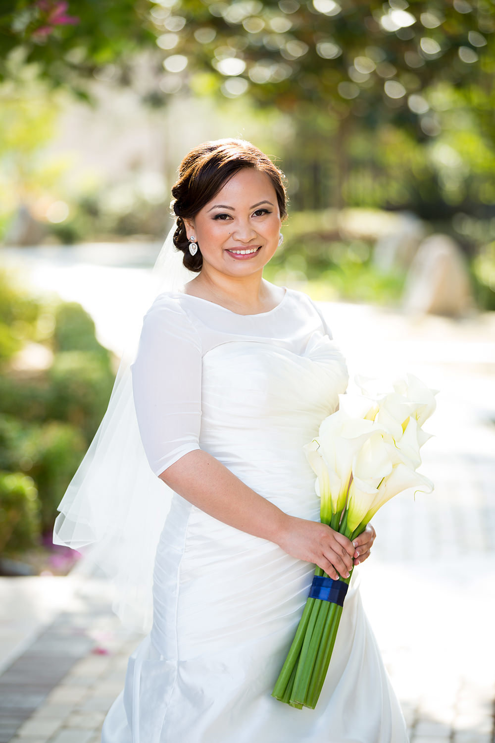 bride with white bouquet