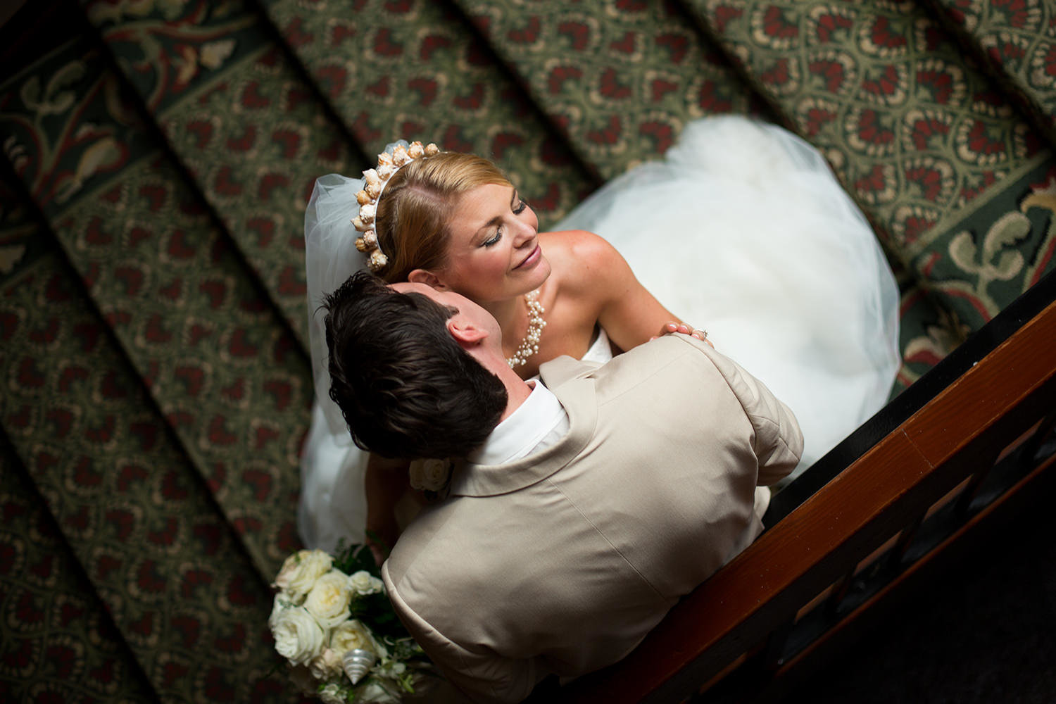 romantic picture of bride and groom on stairs