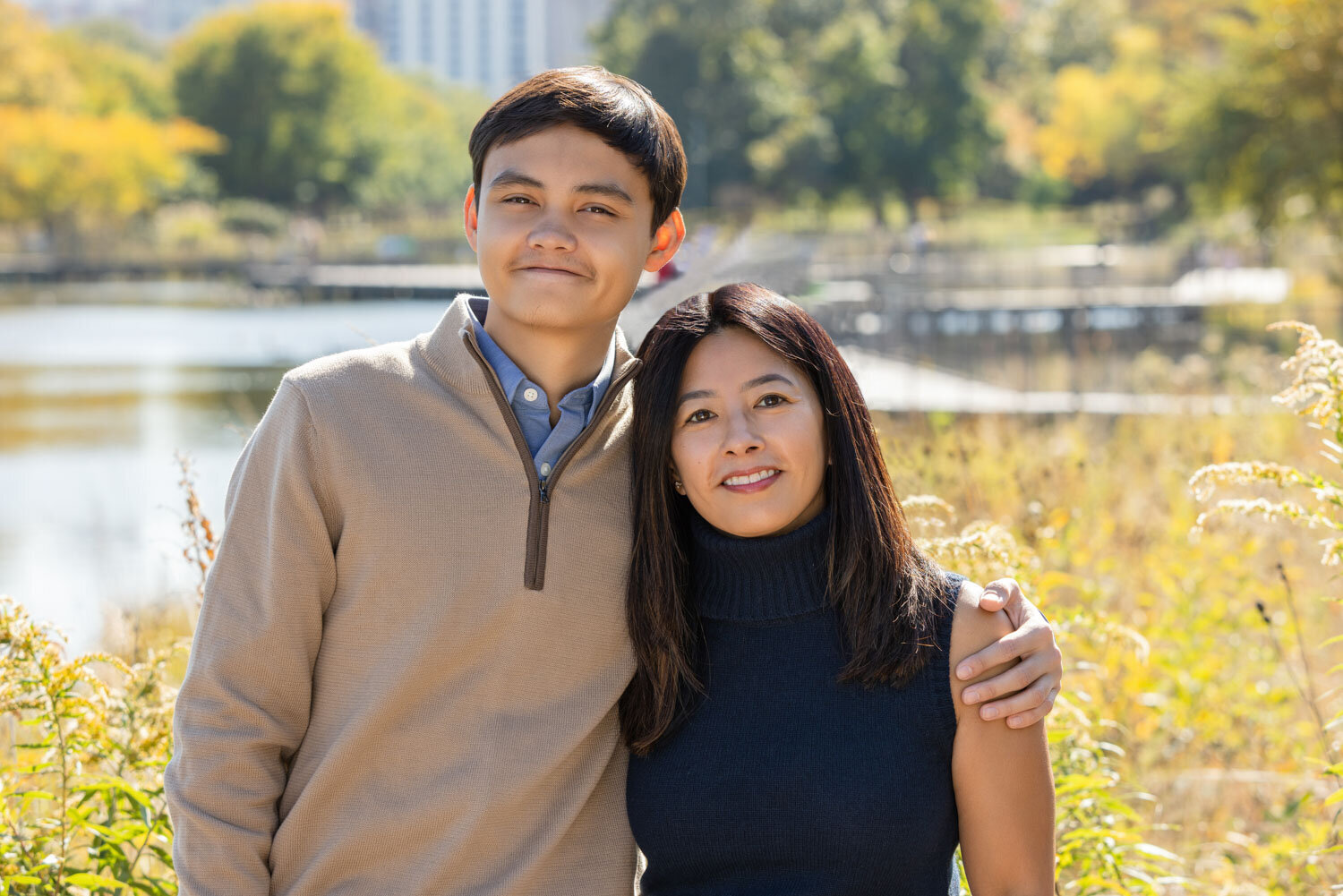 A man and a woman are posing for a picture together