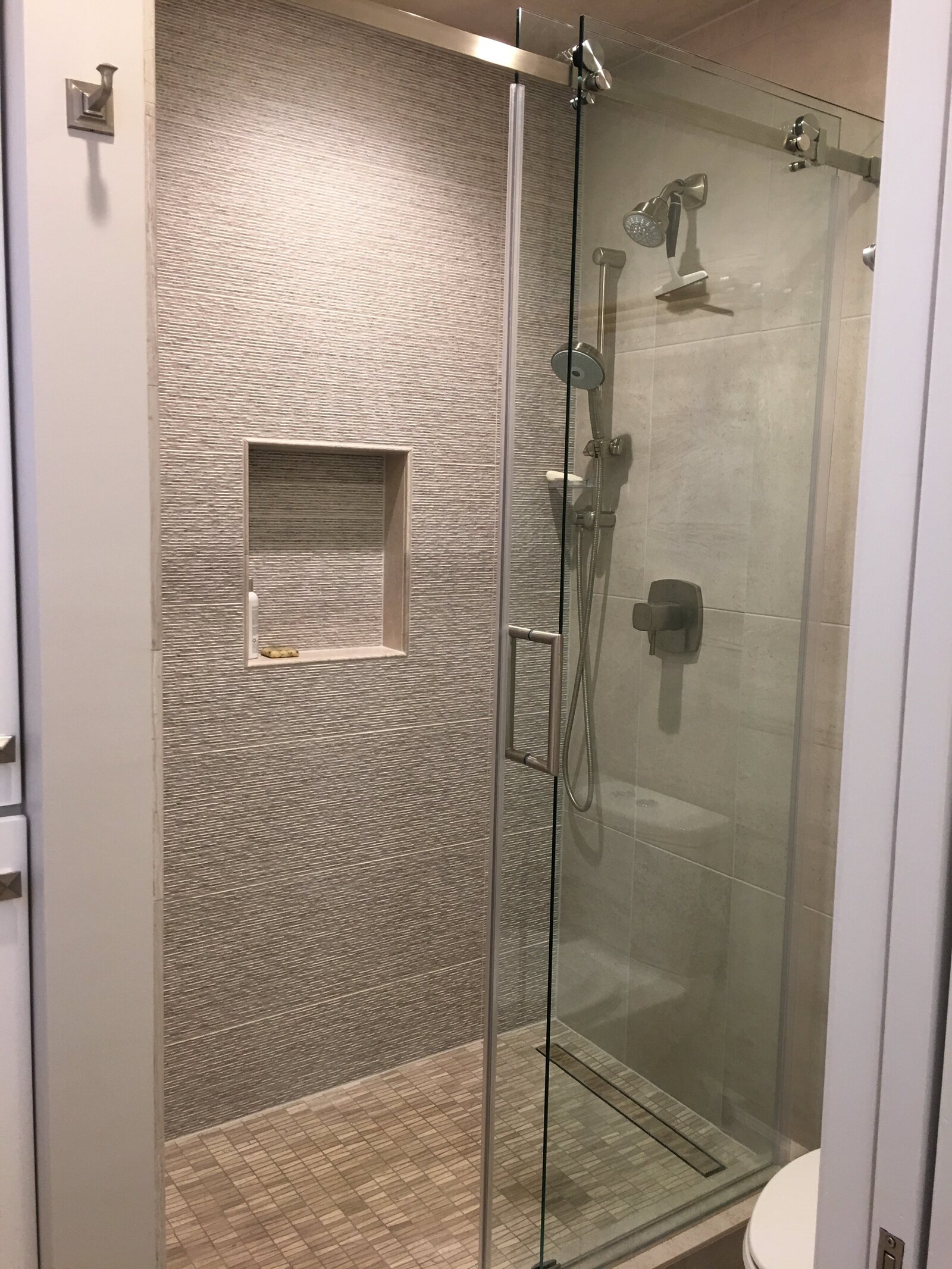 Shower with grey textured tile