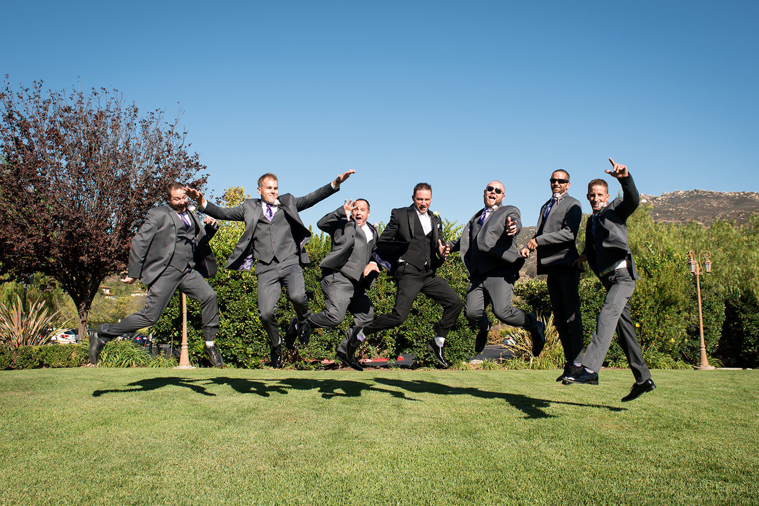 groomsman jumping in the air