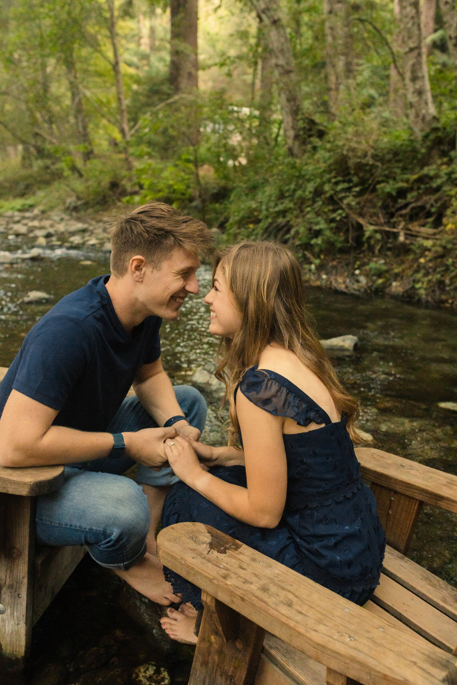 A couple poses for their engagement photos in Big Sur, California.