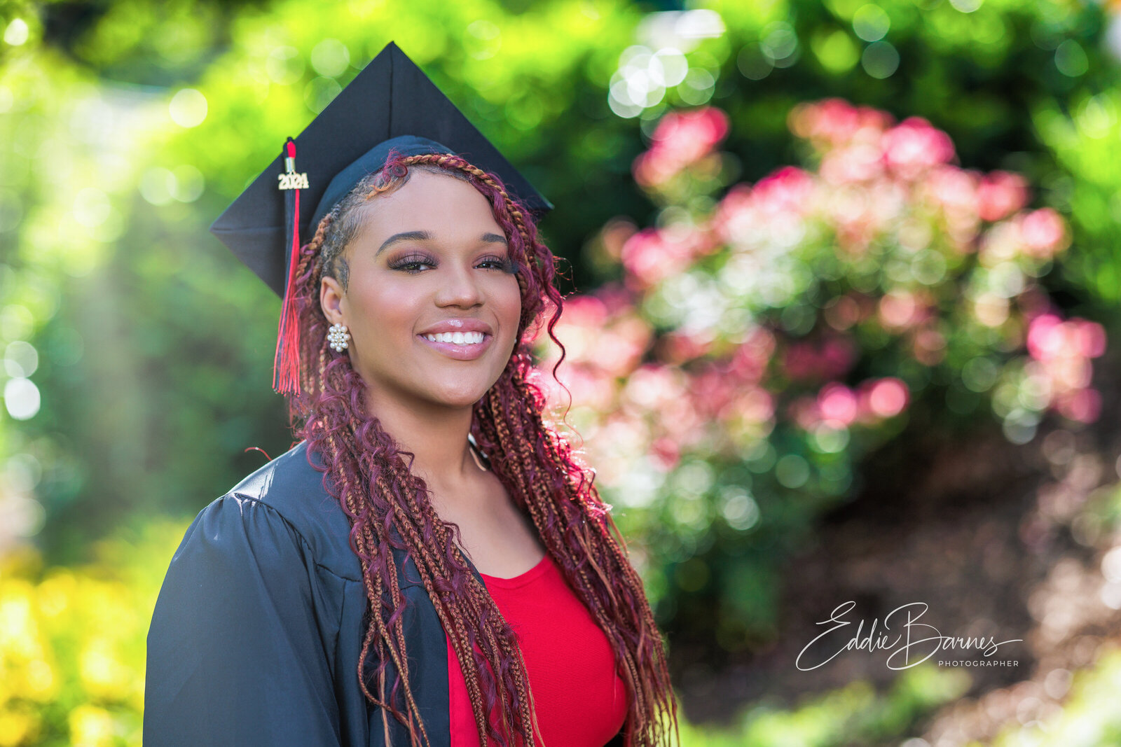 Posing in cap and gown
