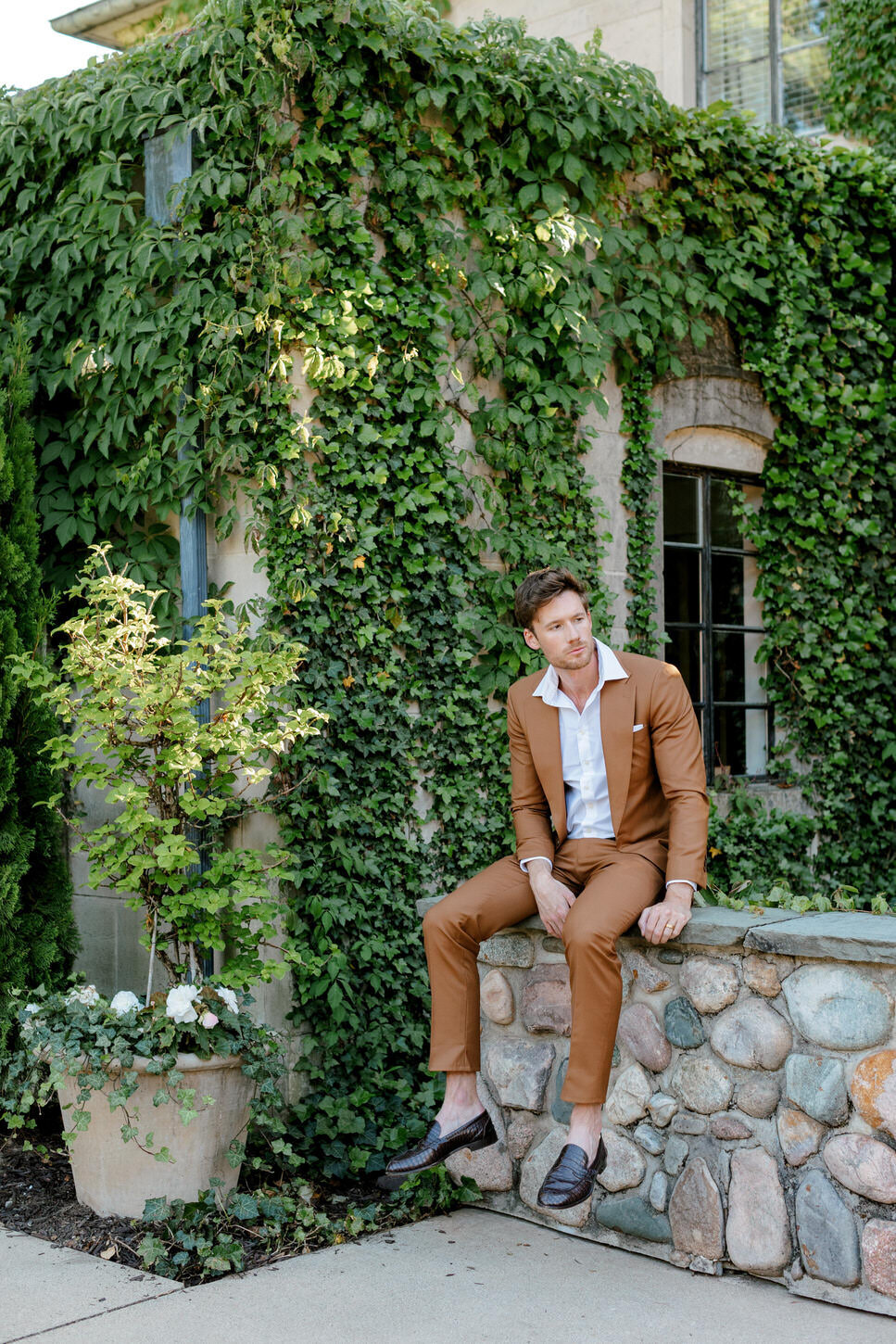 groom-sitting-greencrest-manor