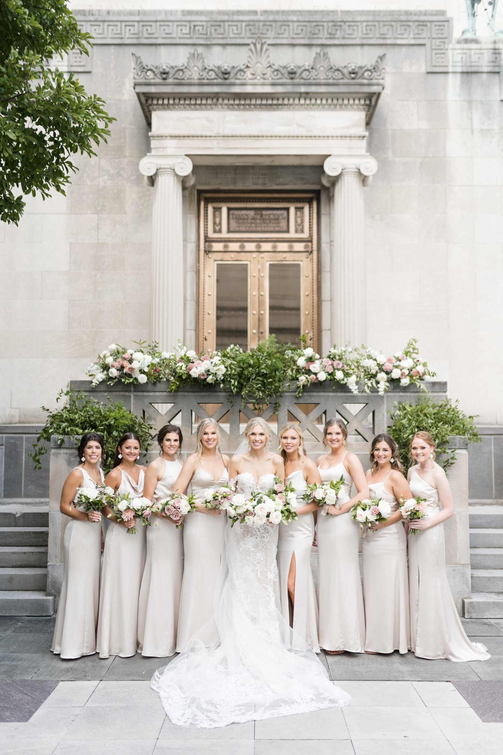 bride and bridesmaids at ceremony site
