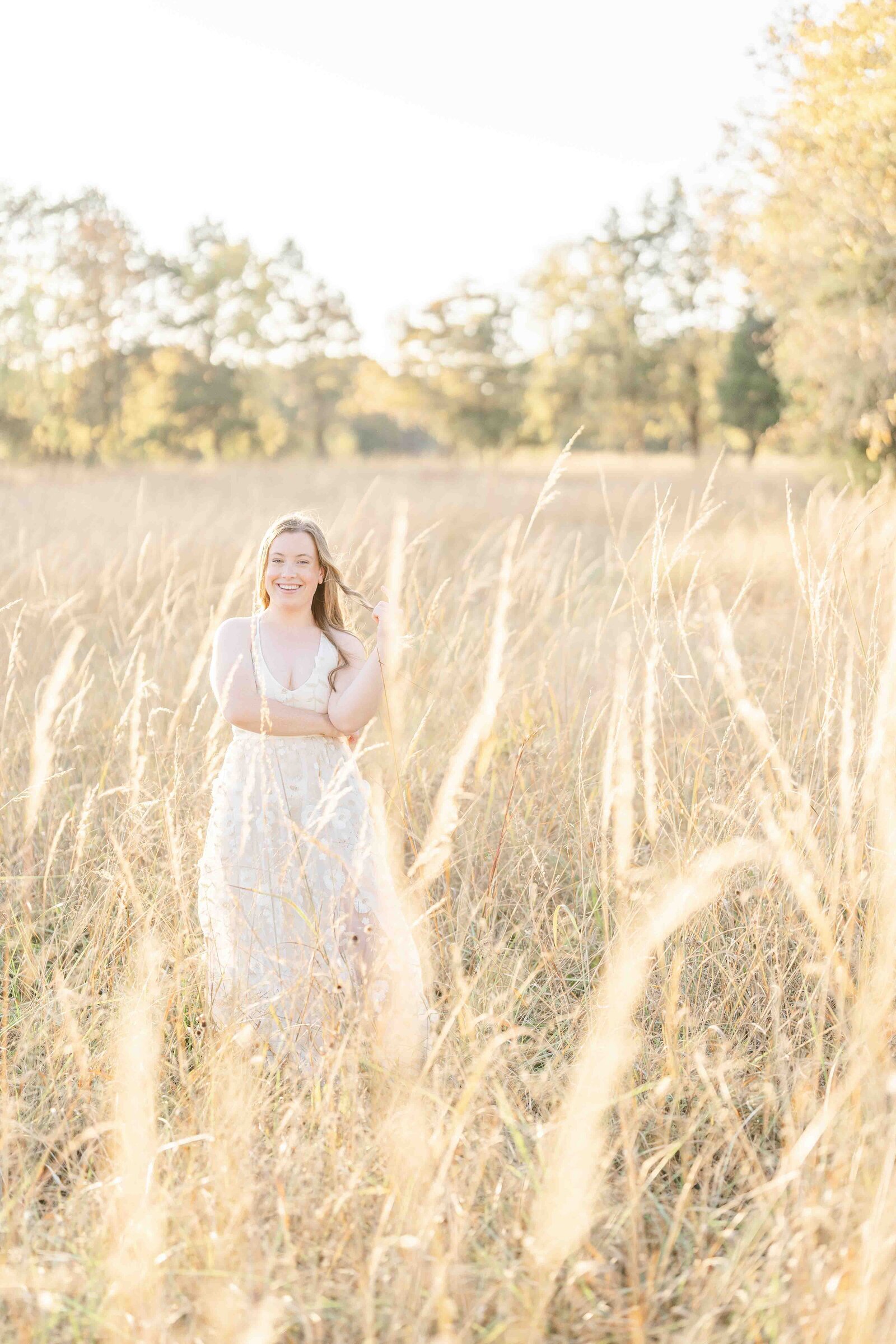 girl in the middle of the field during senior photo Loudoun County, VA
