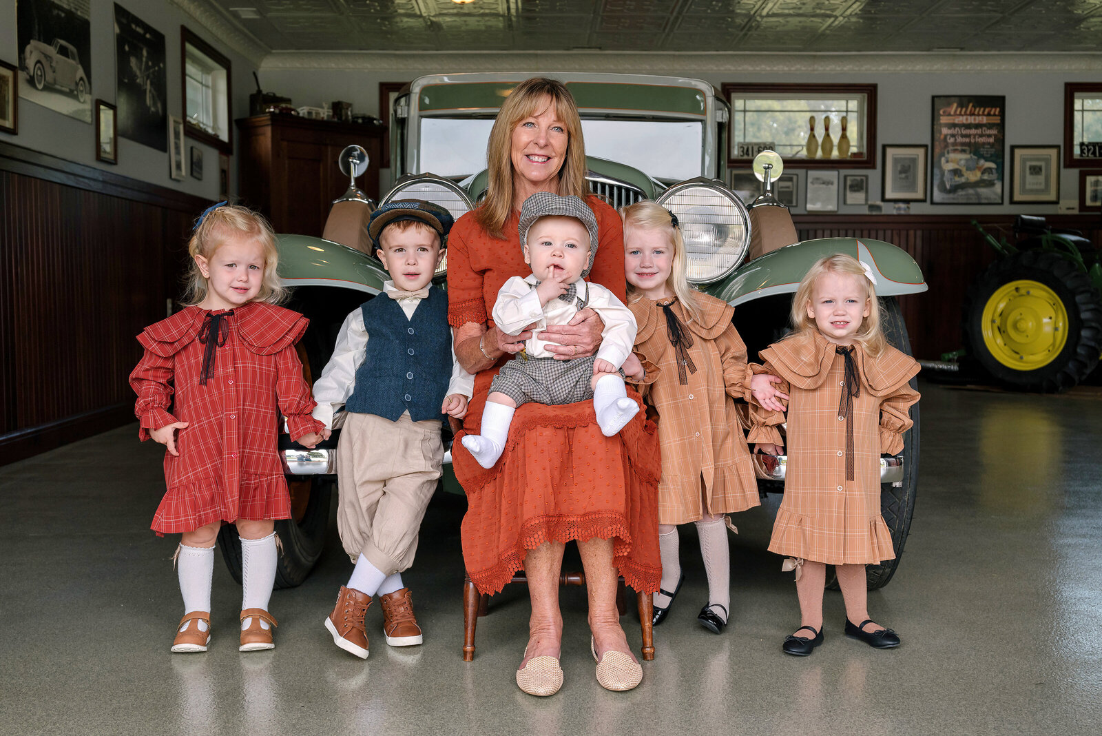 Mom with all her kids dressed in old fashioned clothes