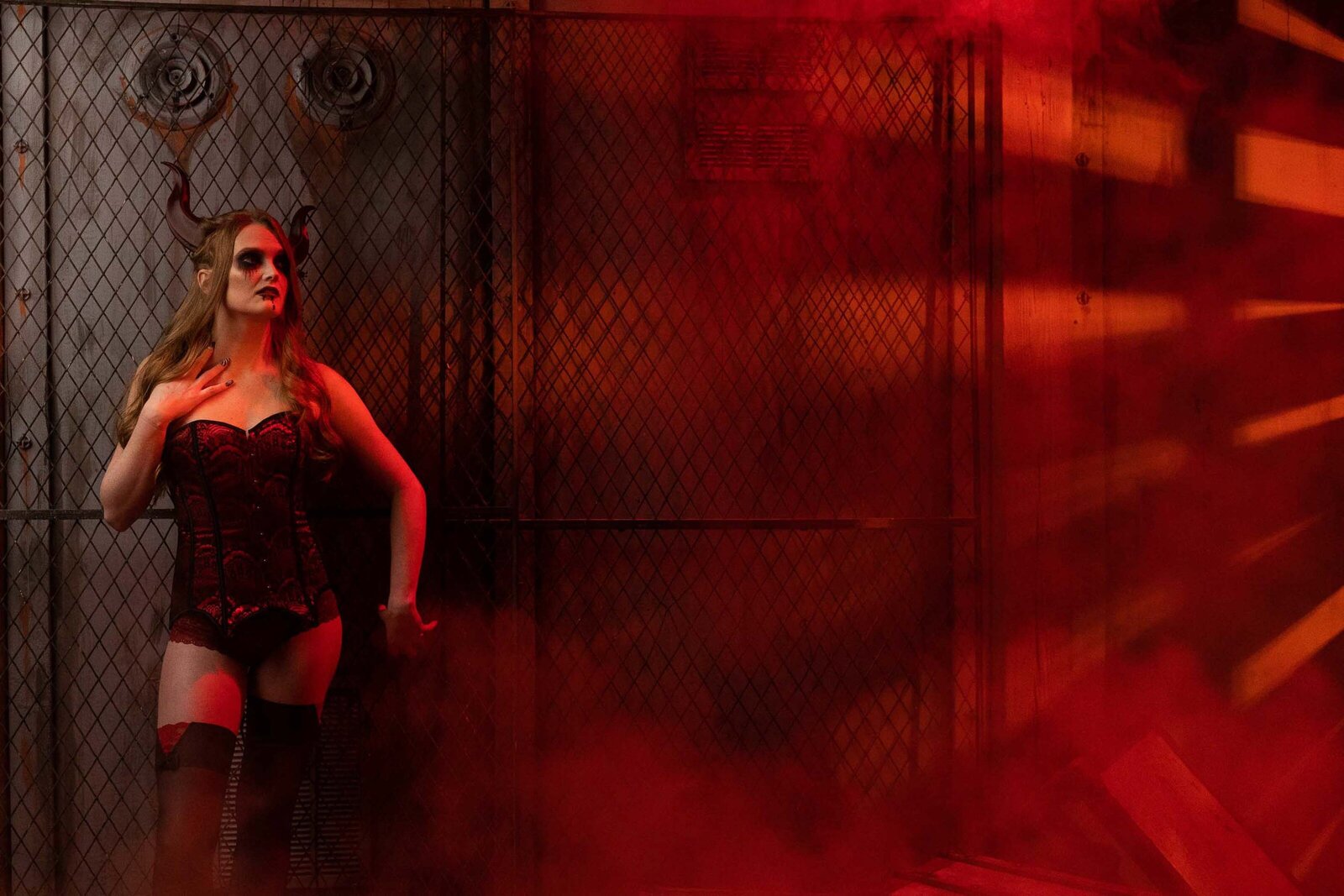 spooky woman in a red light room