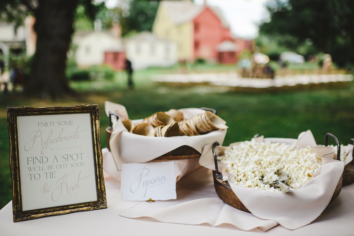 Welcome popcorn station for wedding ceremony at The Webb Barn in Wethersfield, CT