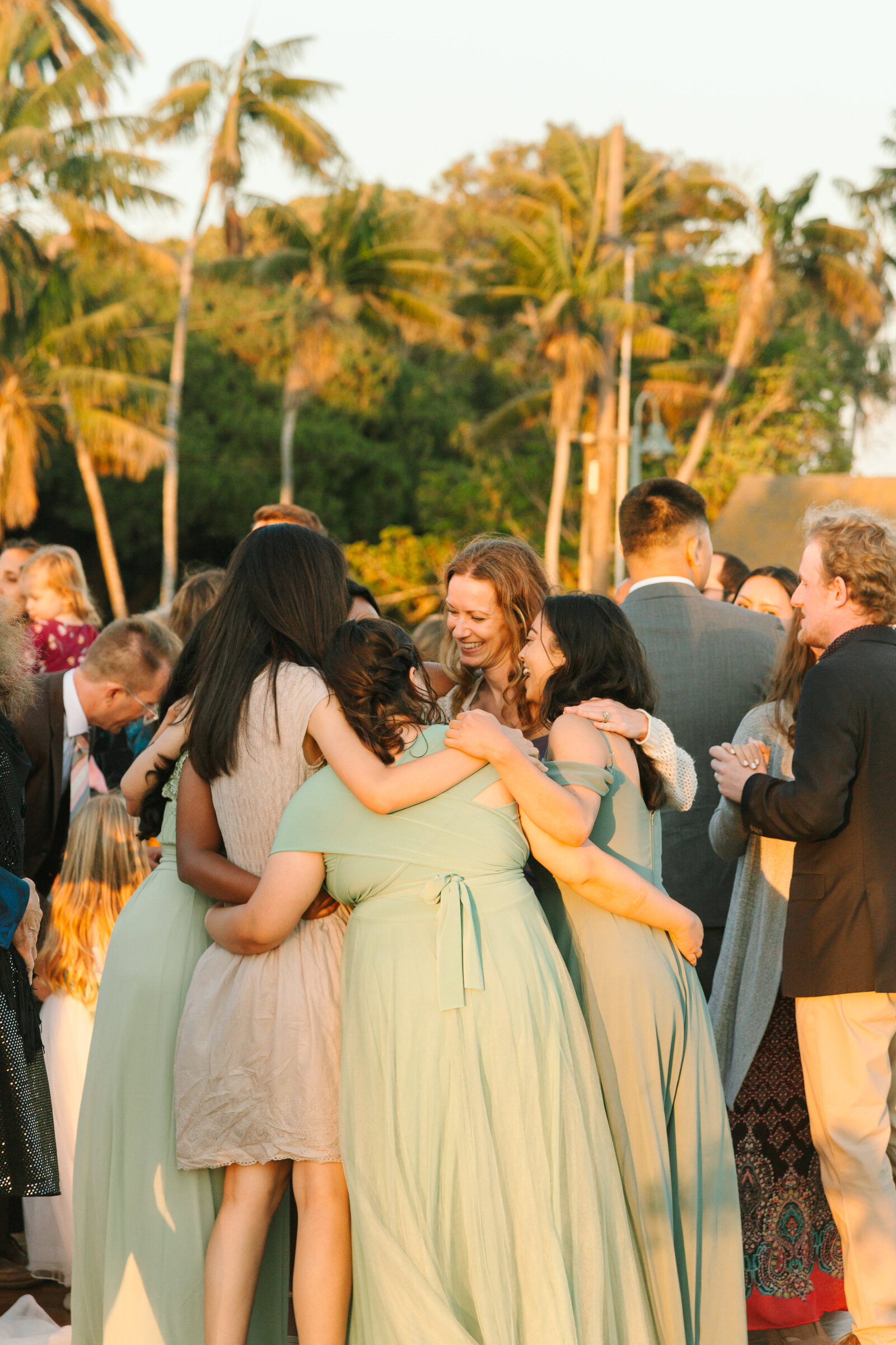 Reception in Los Angeles underneath palm trees.