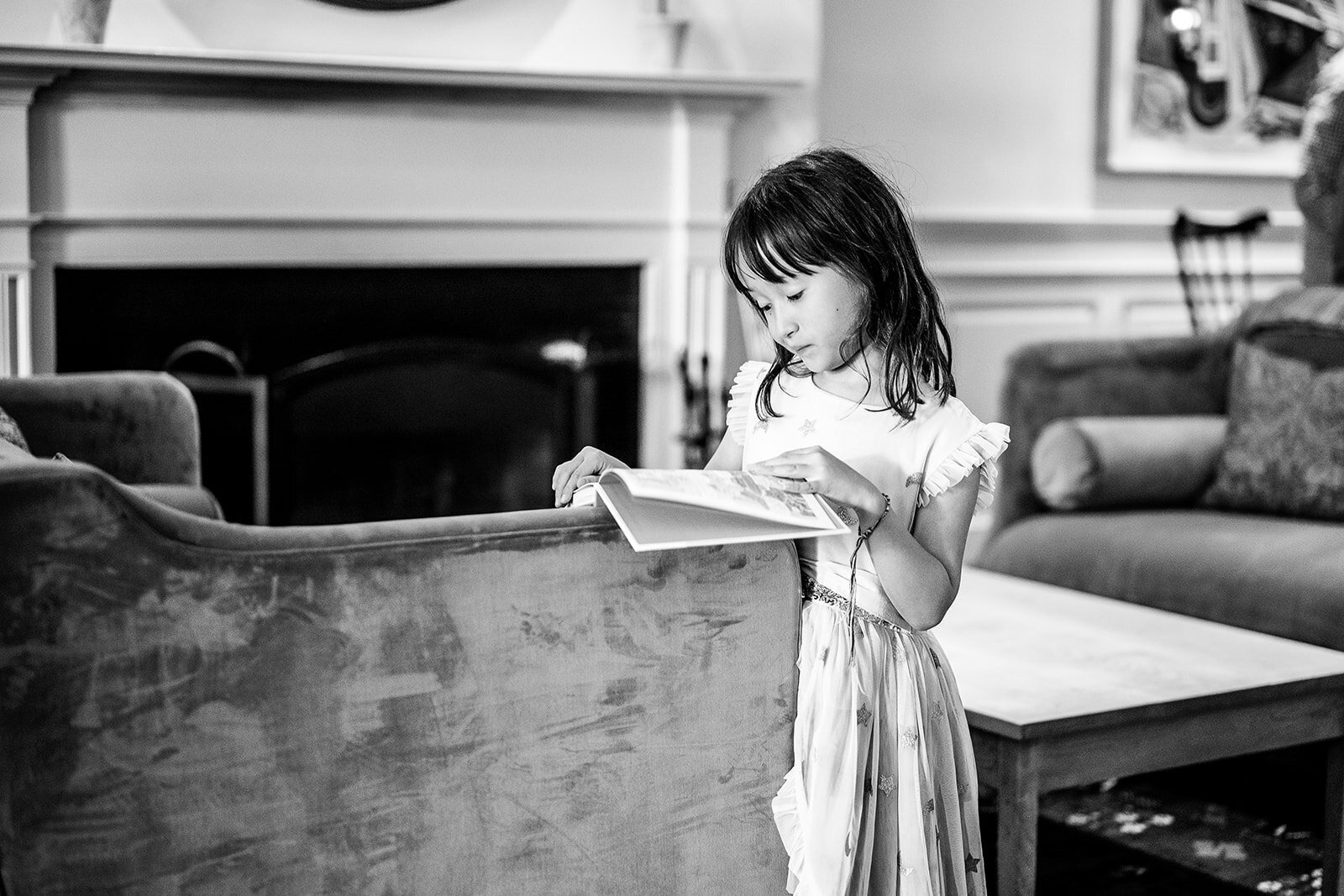 girl-reading-book-at-home-documentary-family-session