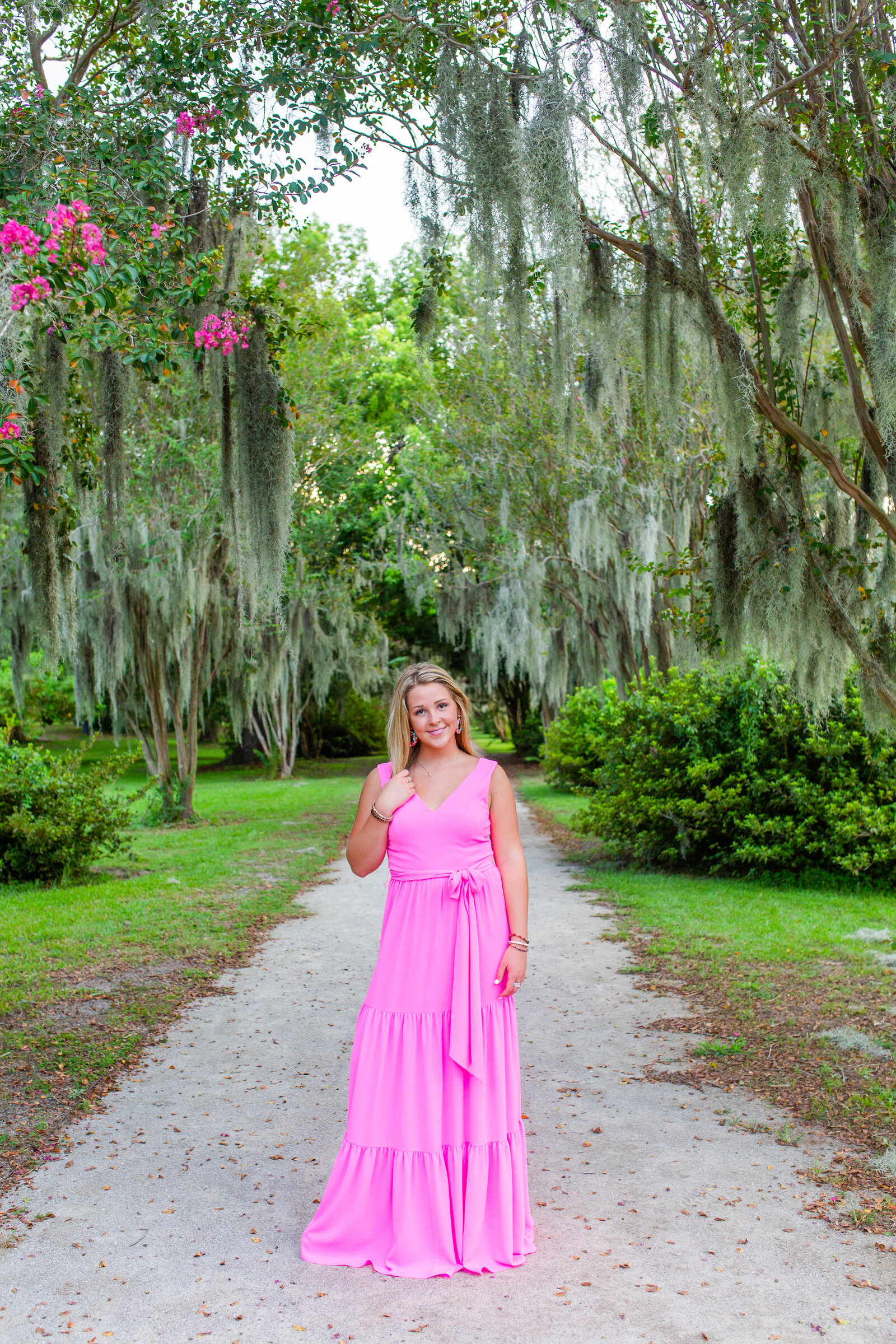 girl in pink dress posing at Hampton Park