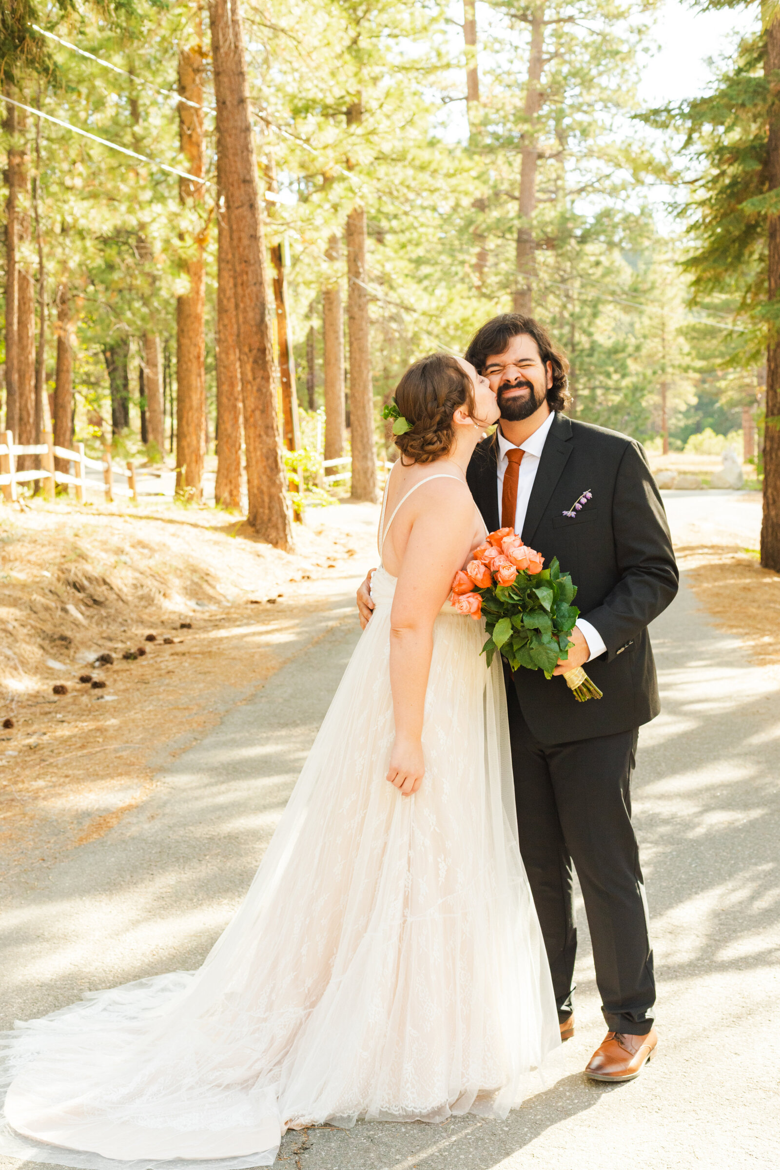 A couple celebrates their intimate elopement at a cabin at Big Bear Lake, California.