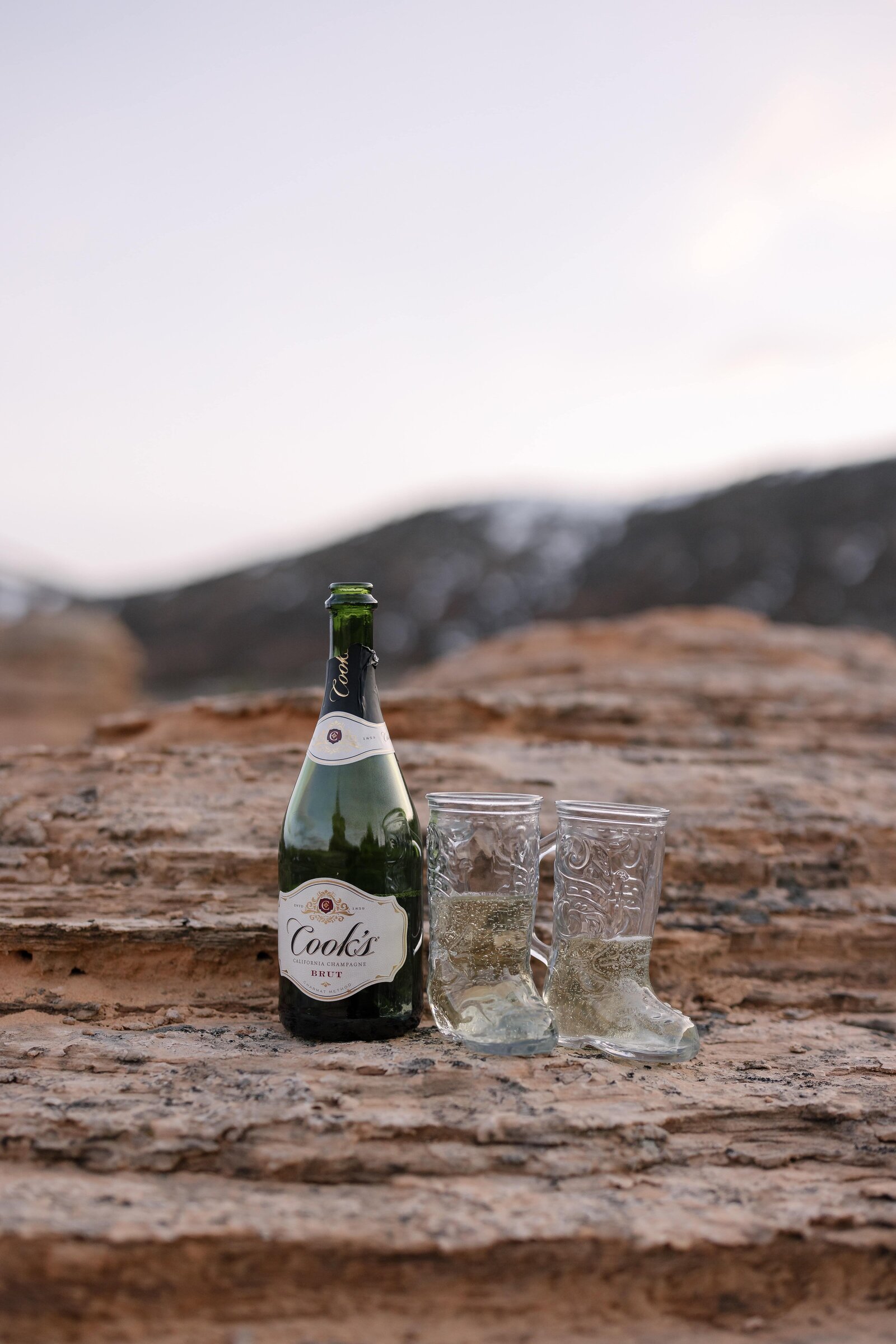 champagne in glass boots