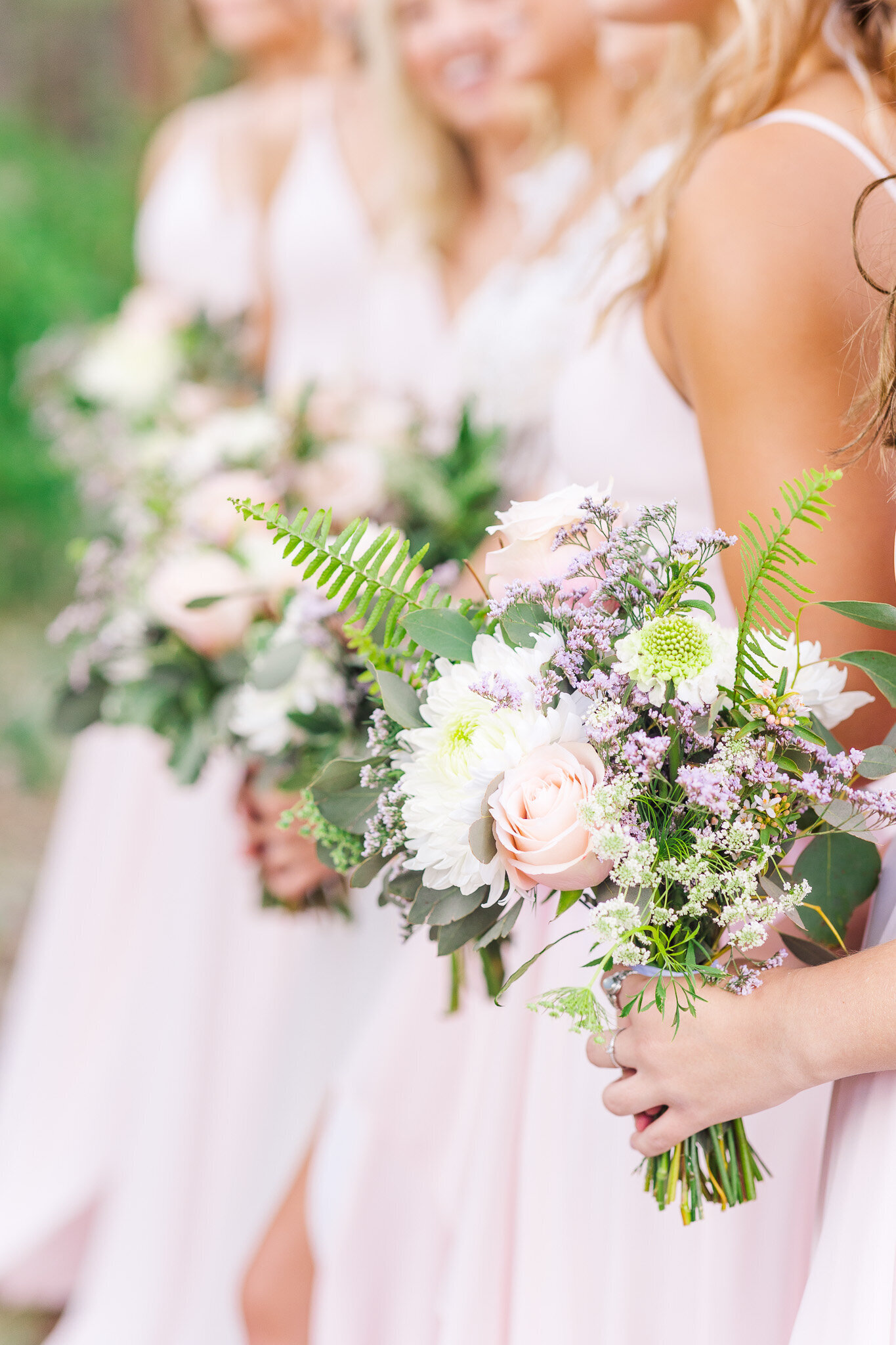 side view of bridesmaids bouquets