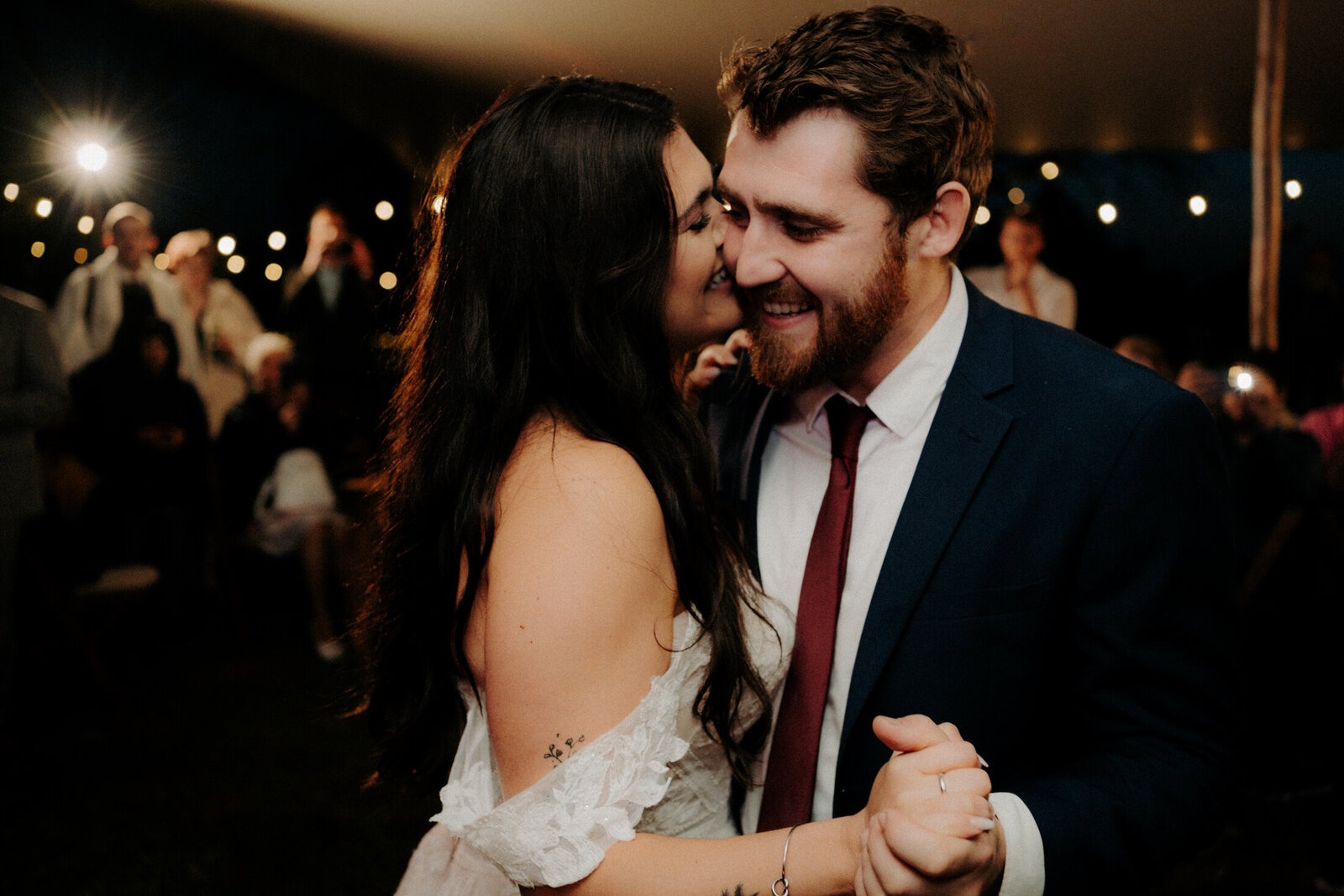 Lovely mage of a bride and groom doing their first dance at their wedding.