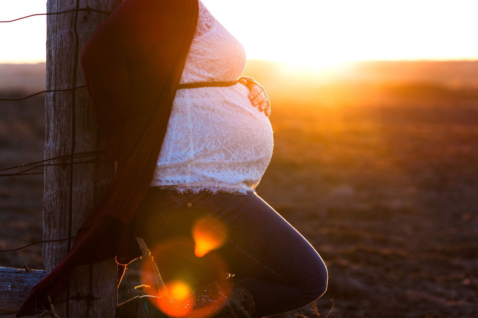 Pregnant woman at sunset near Alliston Ontario