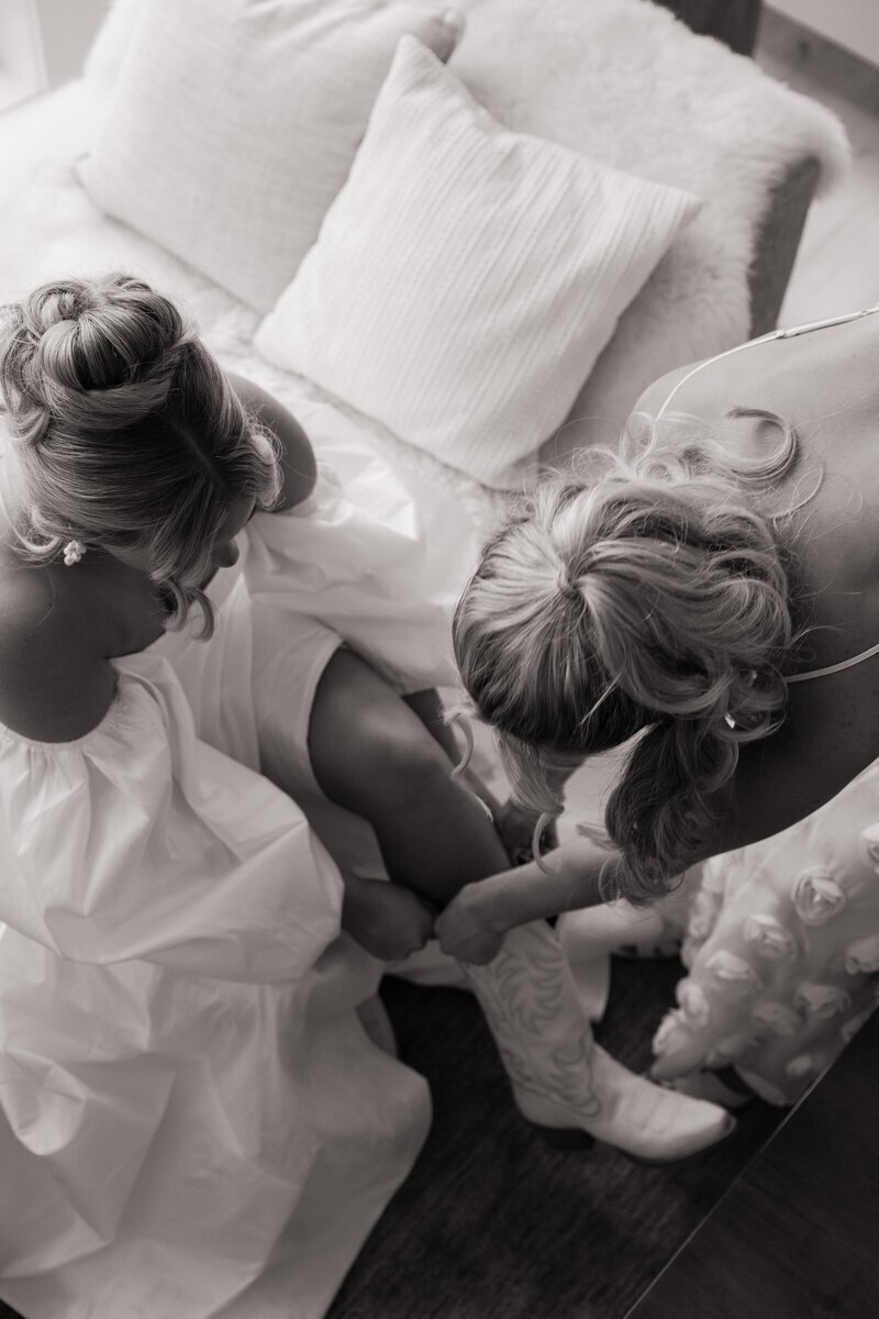 Bride getting ready at wedding by elopement photographer washington