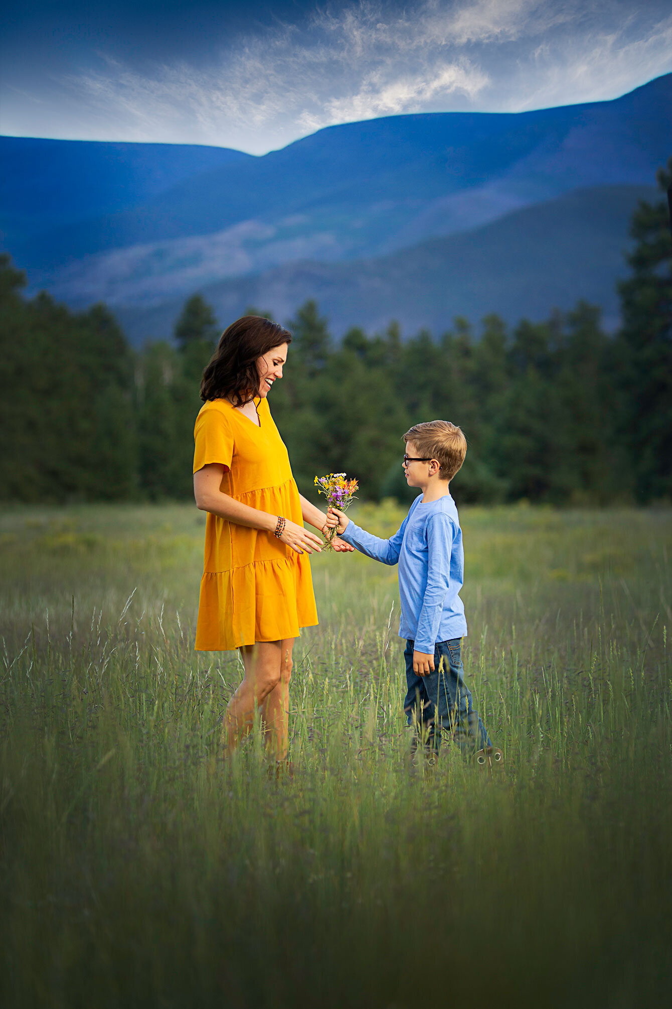 mother-son-flowers-mothers-day-colorado-mountains-mountain-sunset-family-landscape-view-south-forks-Rio-Grande-Club