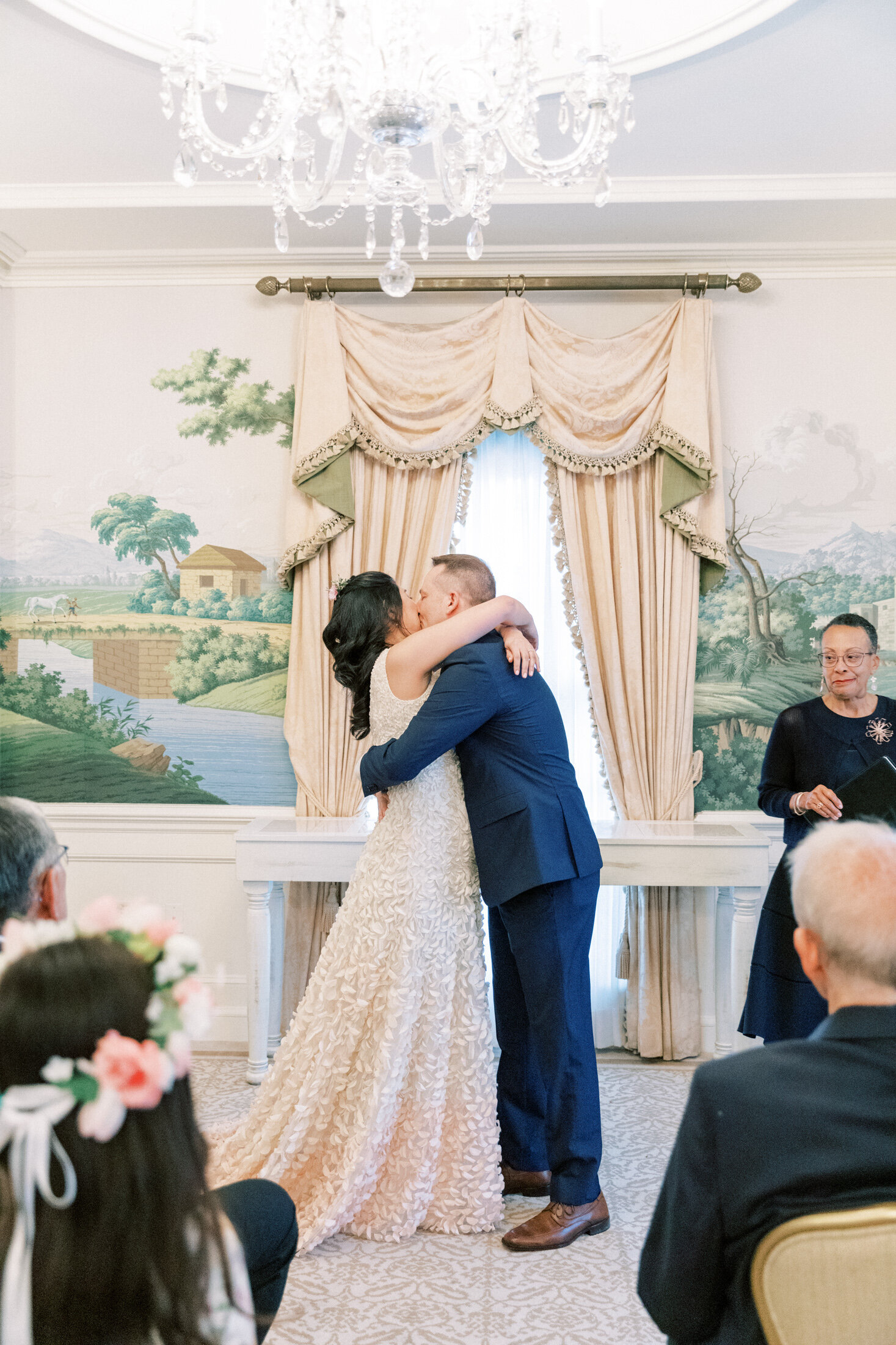 Bride and groom kiss at Hay-Adams Hotel in DC