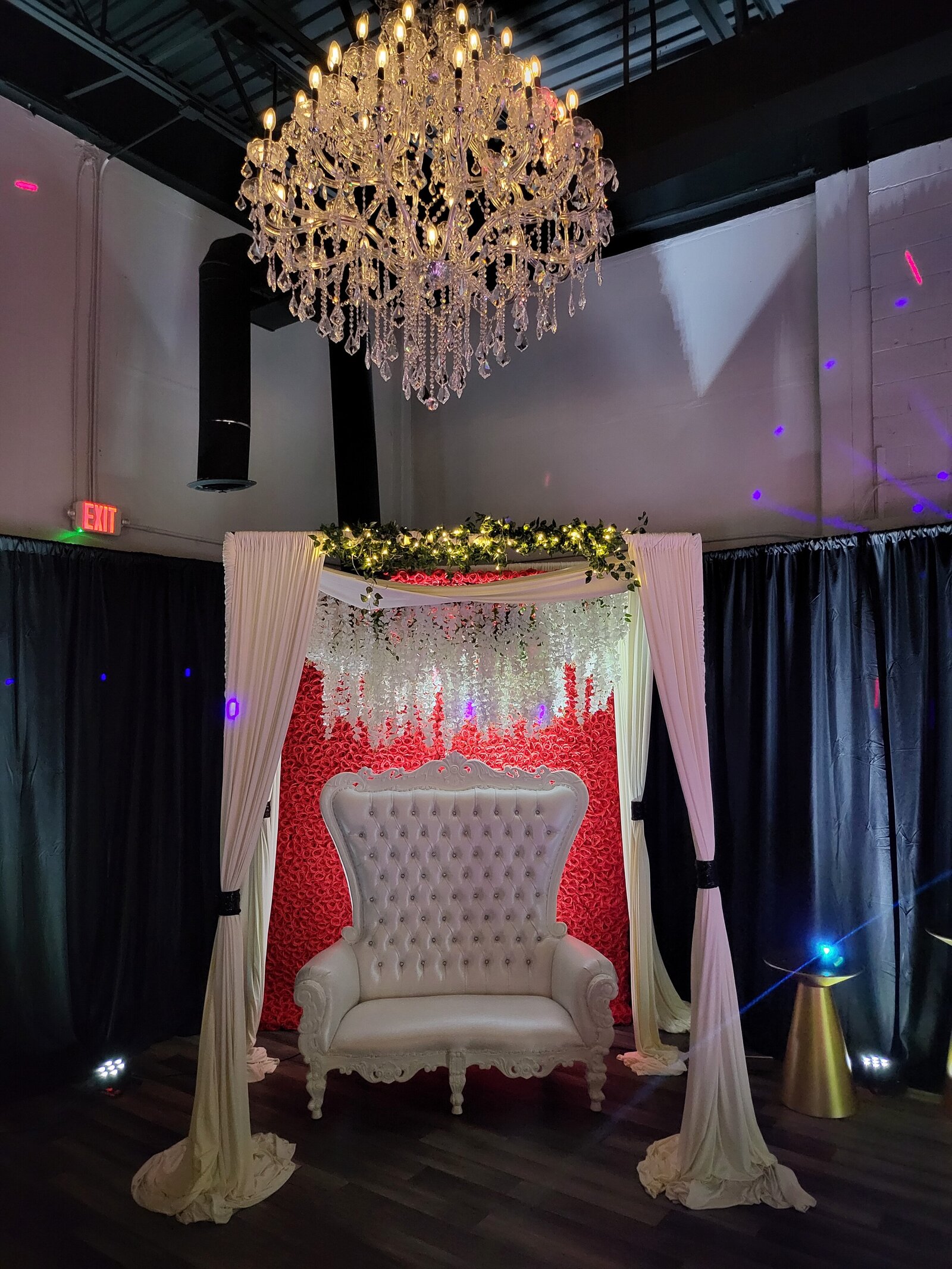 Canopy throne chair and flower wall rentals in Metro Detroit Event Space