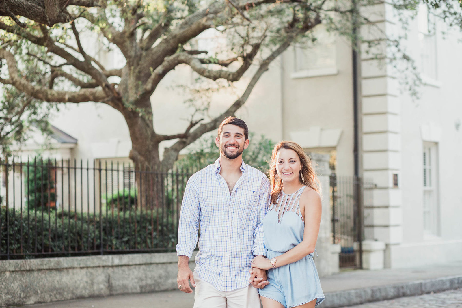 Engaged couple walking down path, Waterfront Park, Charleston, South Carolina