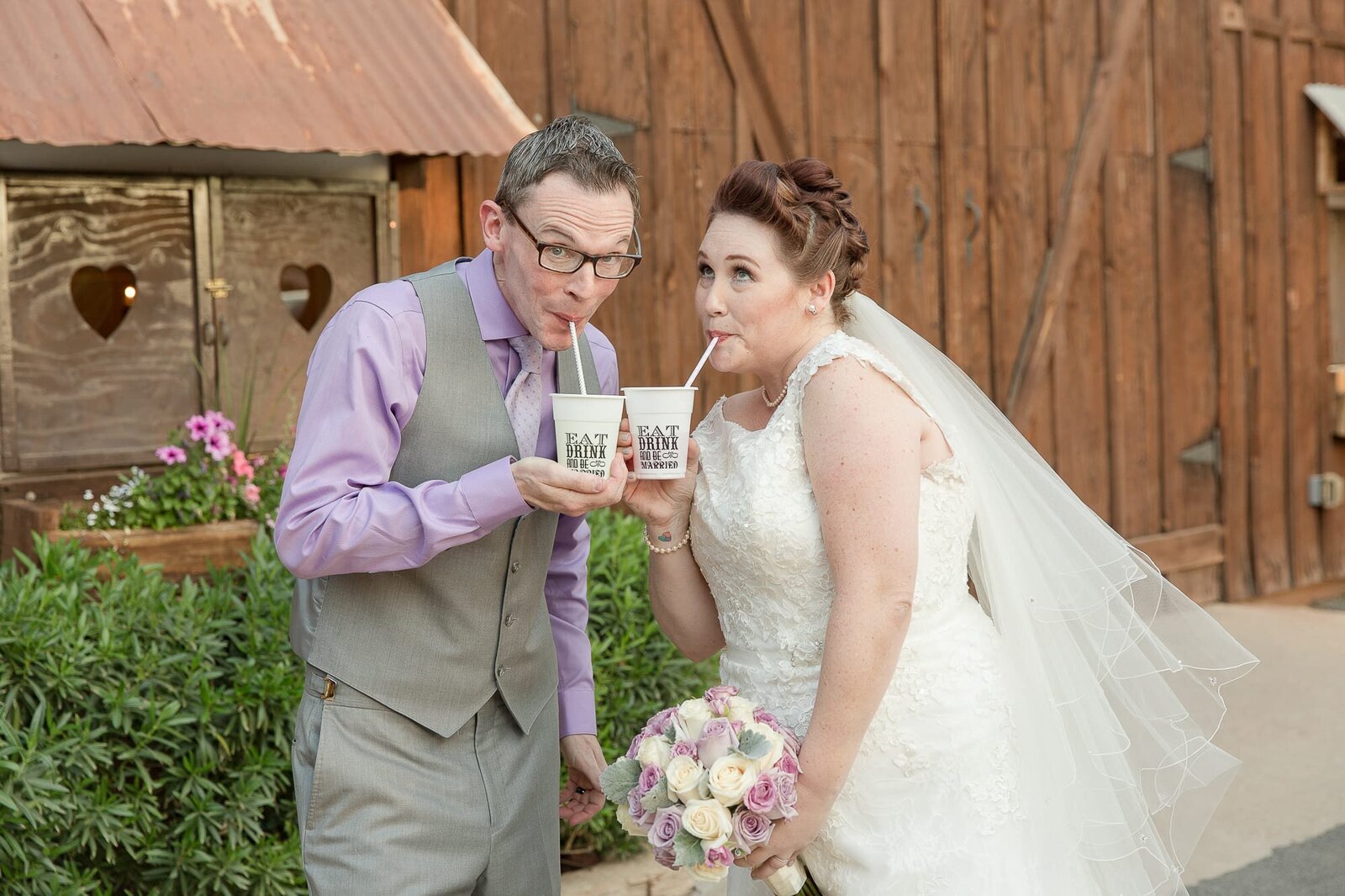 groom-and-bride-sipping-from-custom-cups-shenandoah-mills