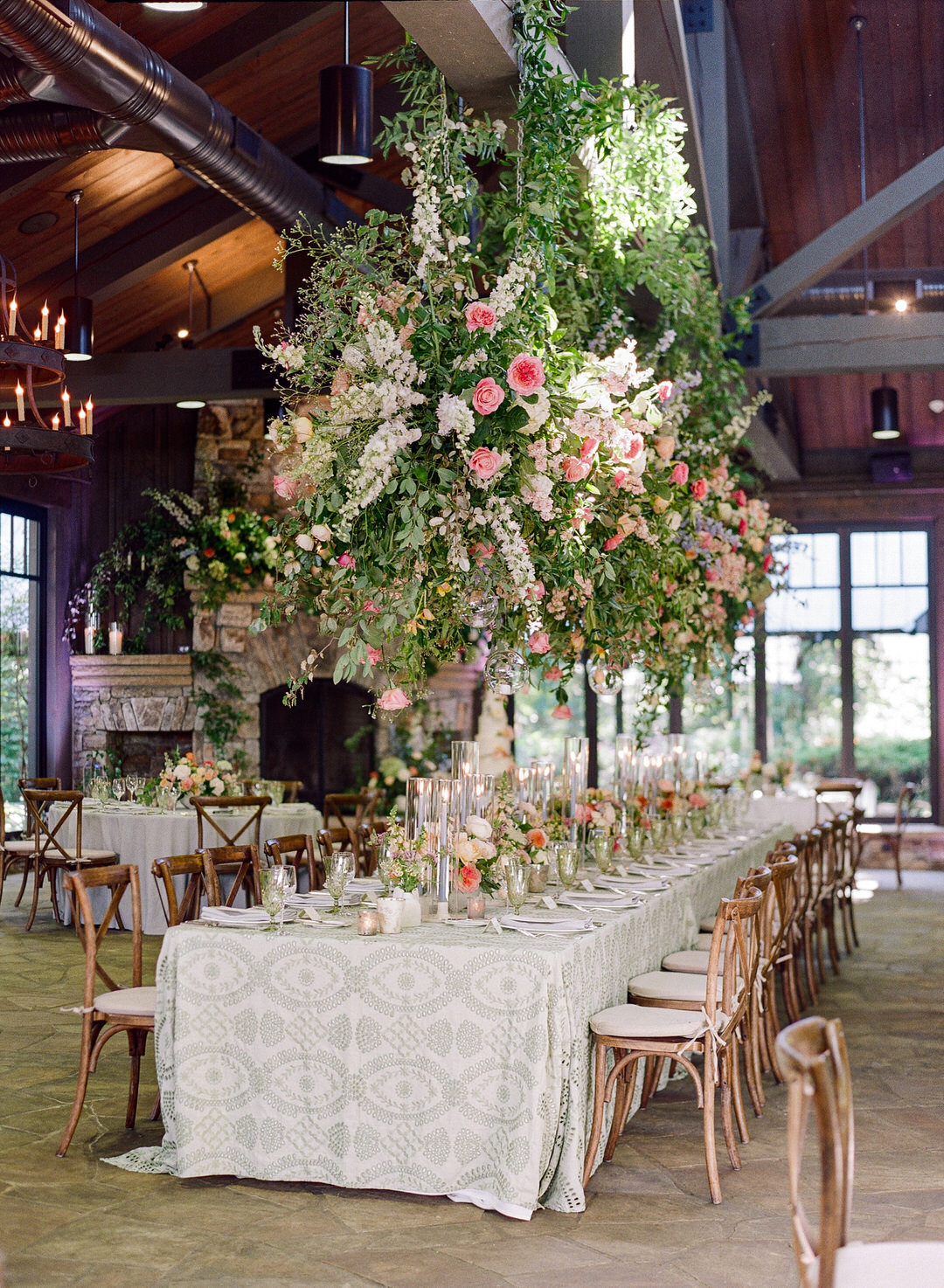 Wedding Reception head table with flowers hanging over top