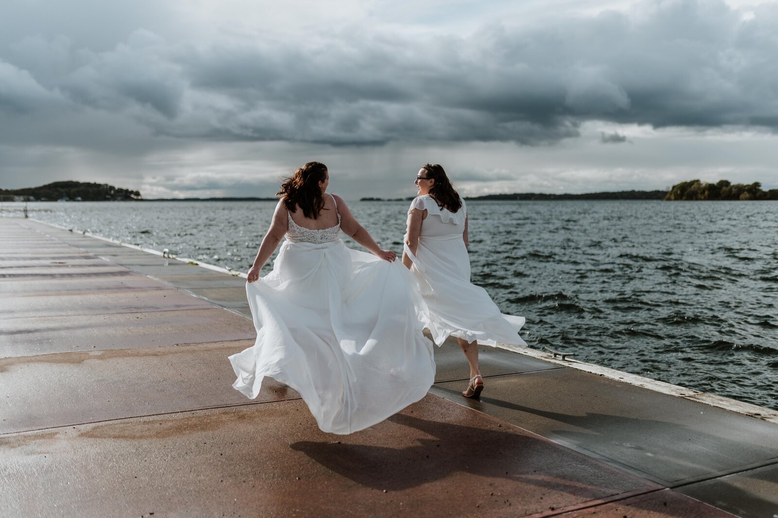 Eloping couple walking along the St. Lawrence river