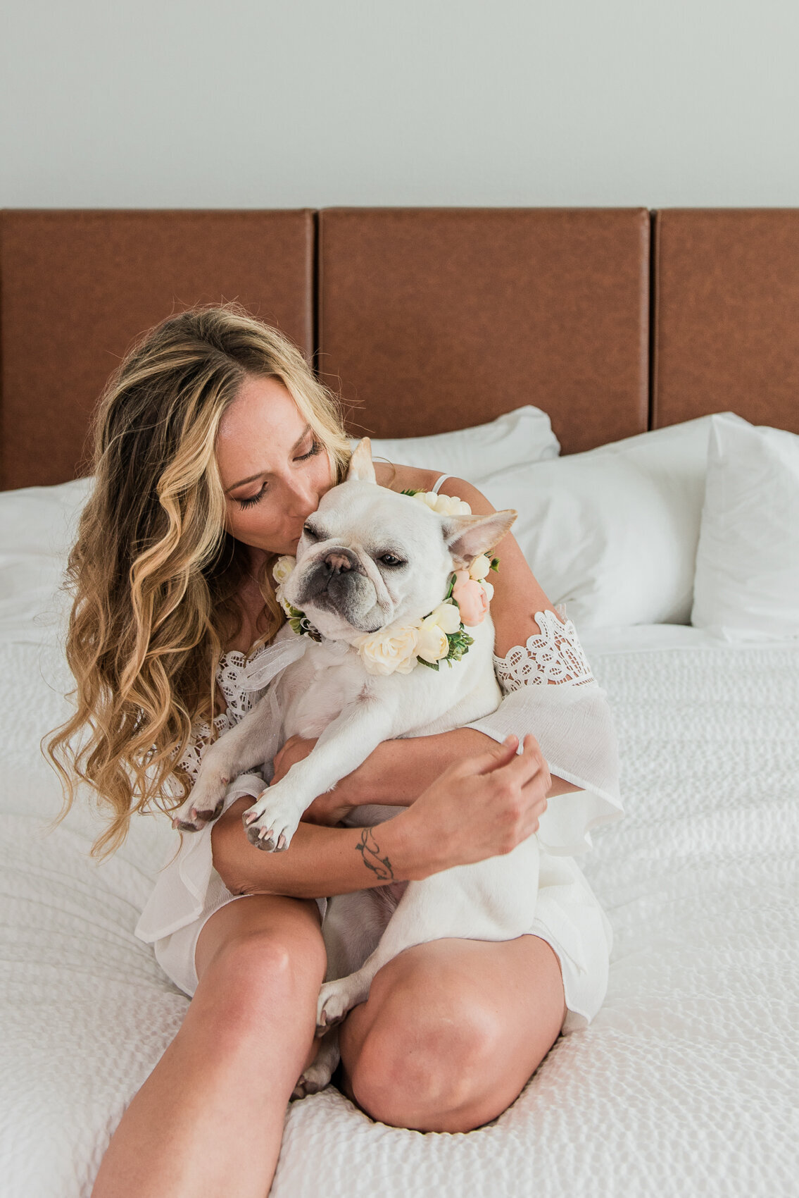 bride and her dog while getting ready