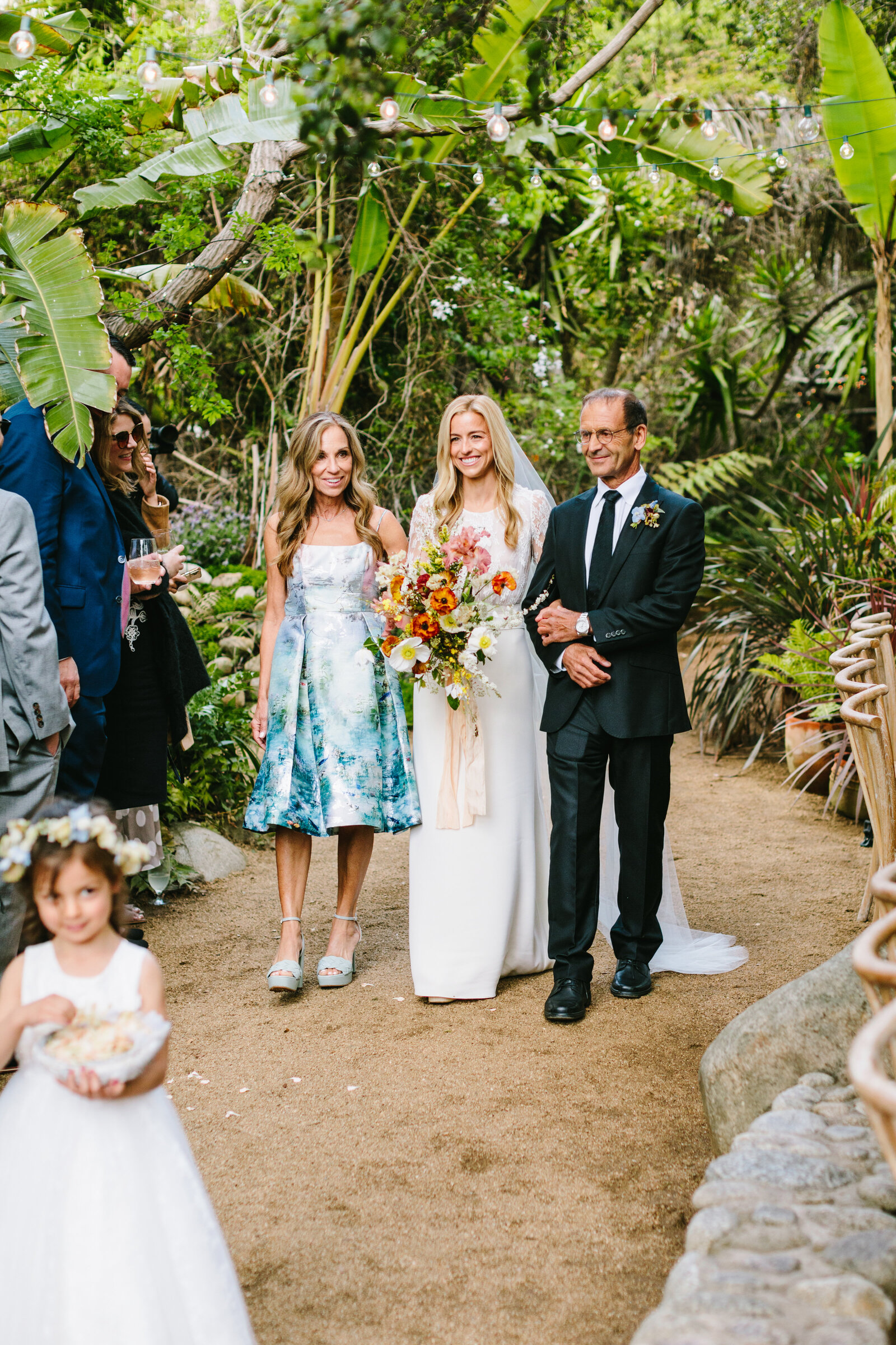 Bride with Mom and Dad Walking down the Aisle at the Holly Farm