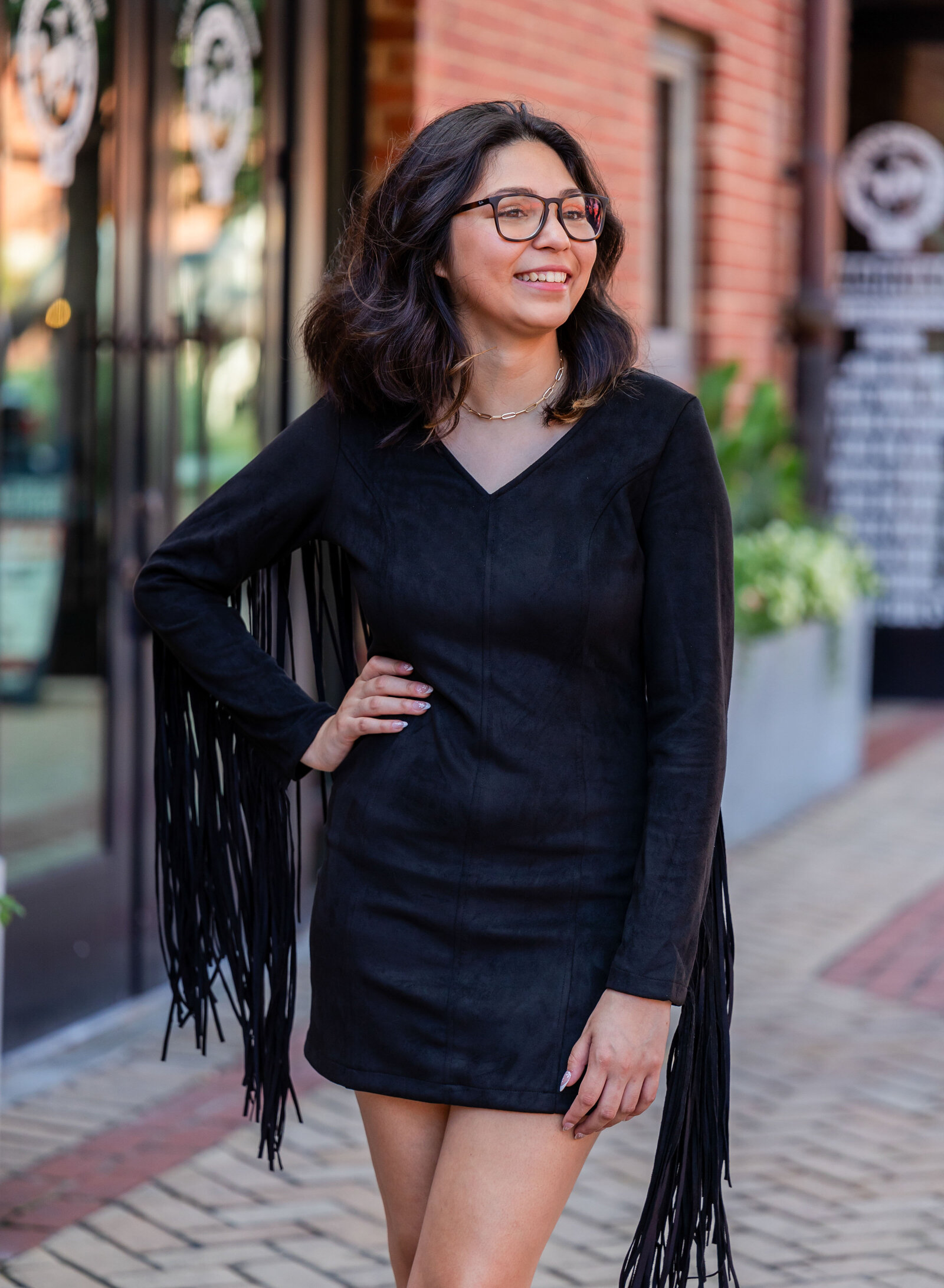senior girl in fringe outfit