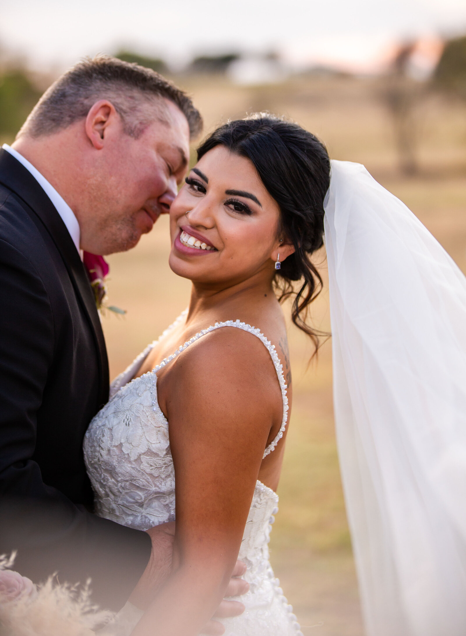 groom kissing bride