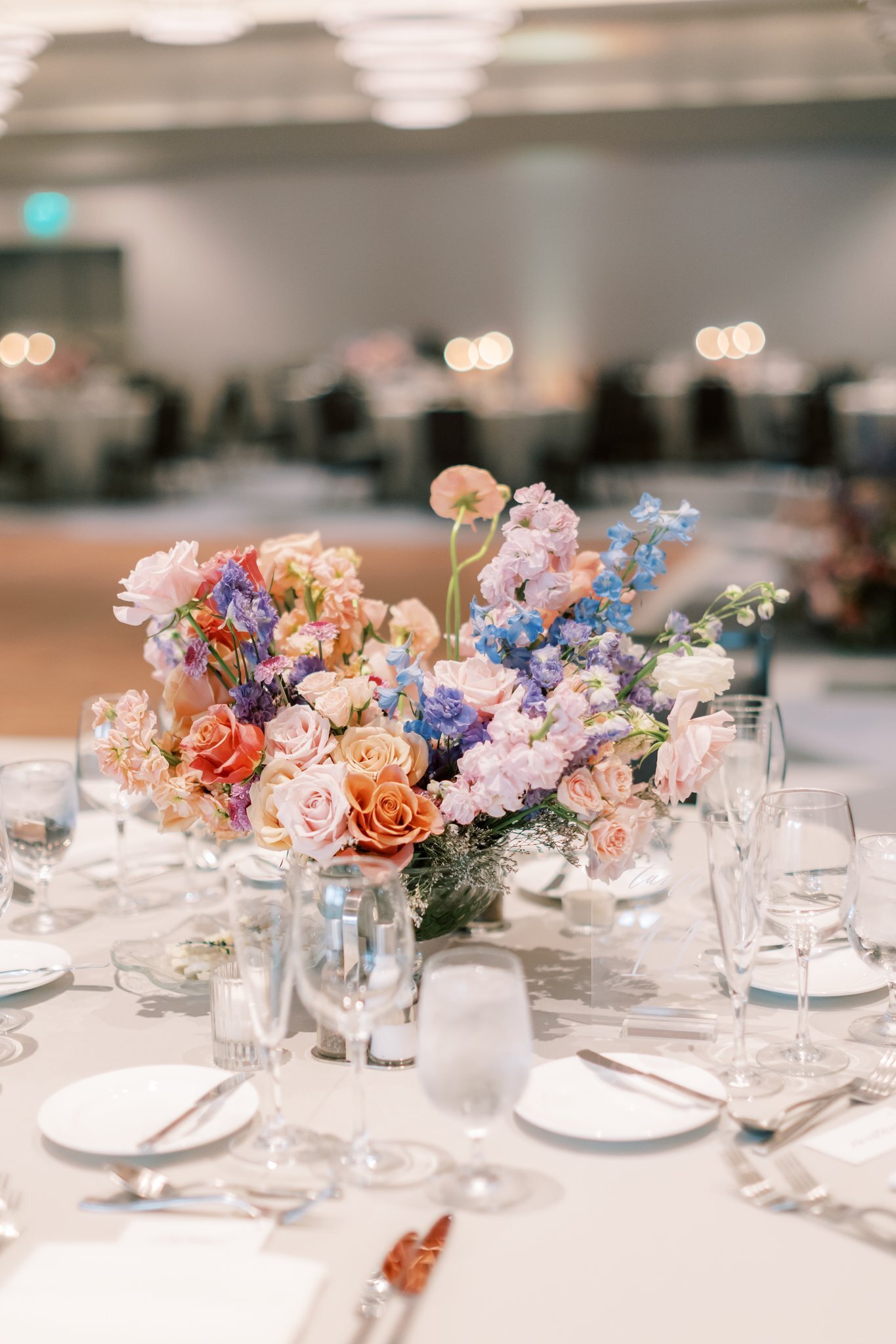 organic-wedding-flowers-reception-centerpiece-flowers-pink-peach-blue-purple