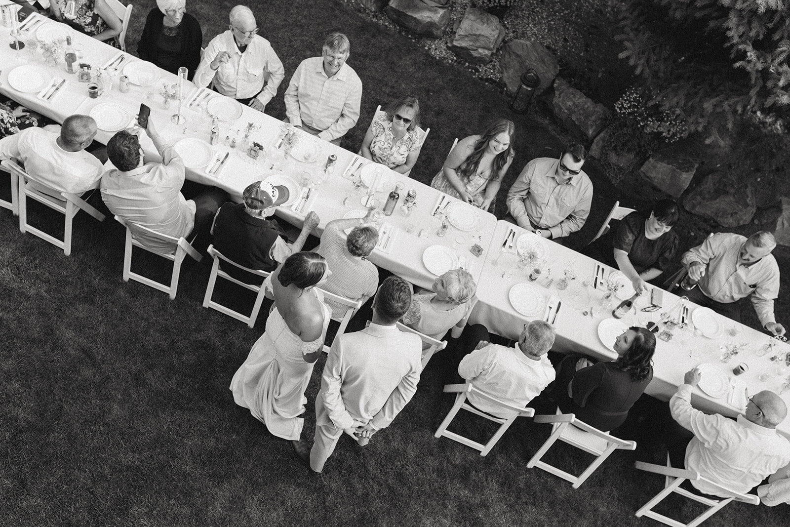 photo of wedding guests at backyard wedding in fernie