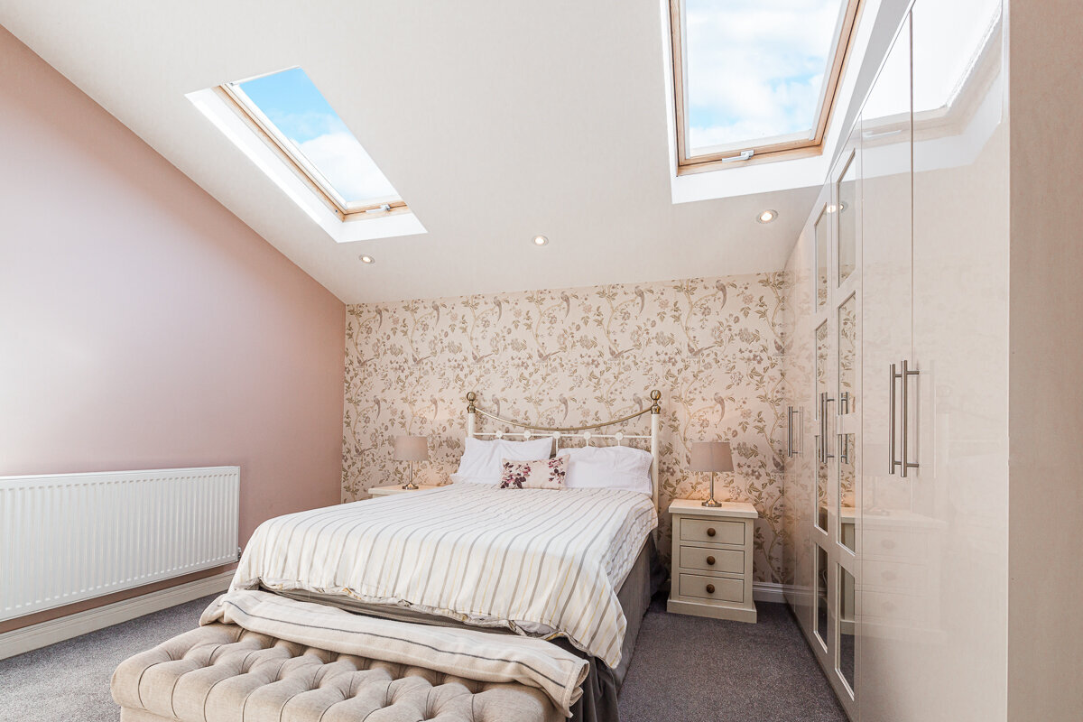 real estate property photography liverpool pink bedroom with skylight