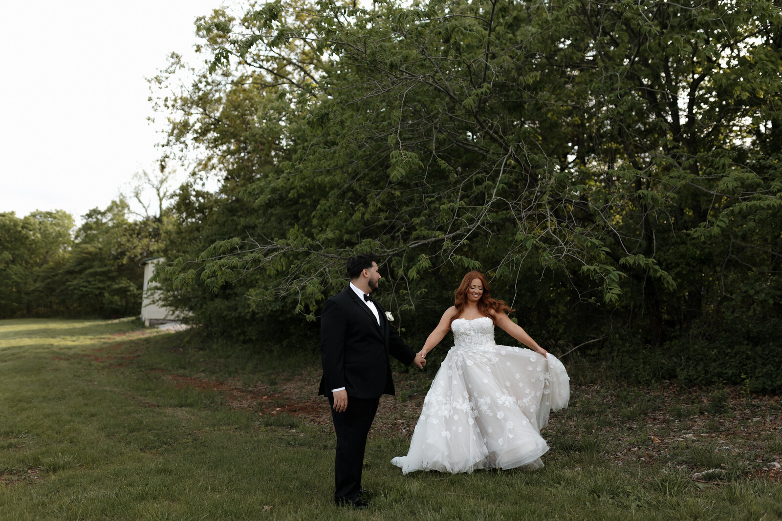 Charleville Brewery & WInery couples candid wedding portrait spinning dress